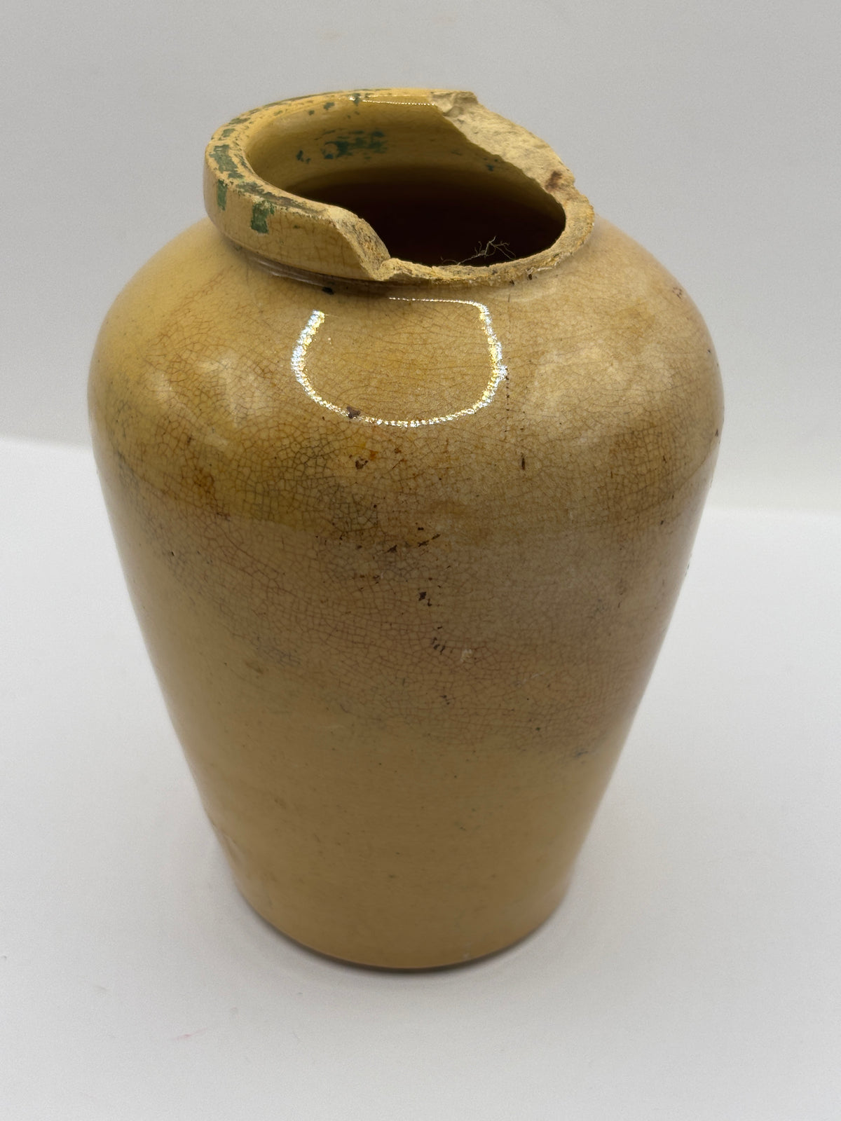 Old advertising cream pot,  Manchester creamery. Damaged