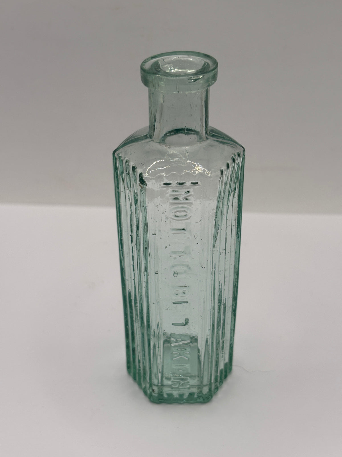 Old aqua glass poison bottle, Not to be taken