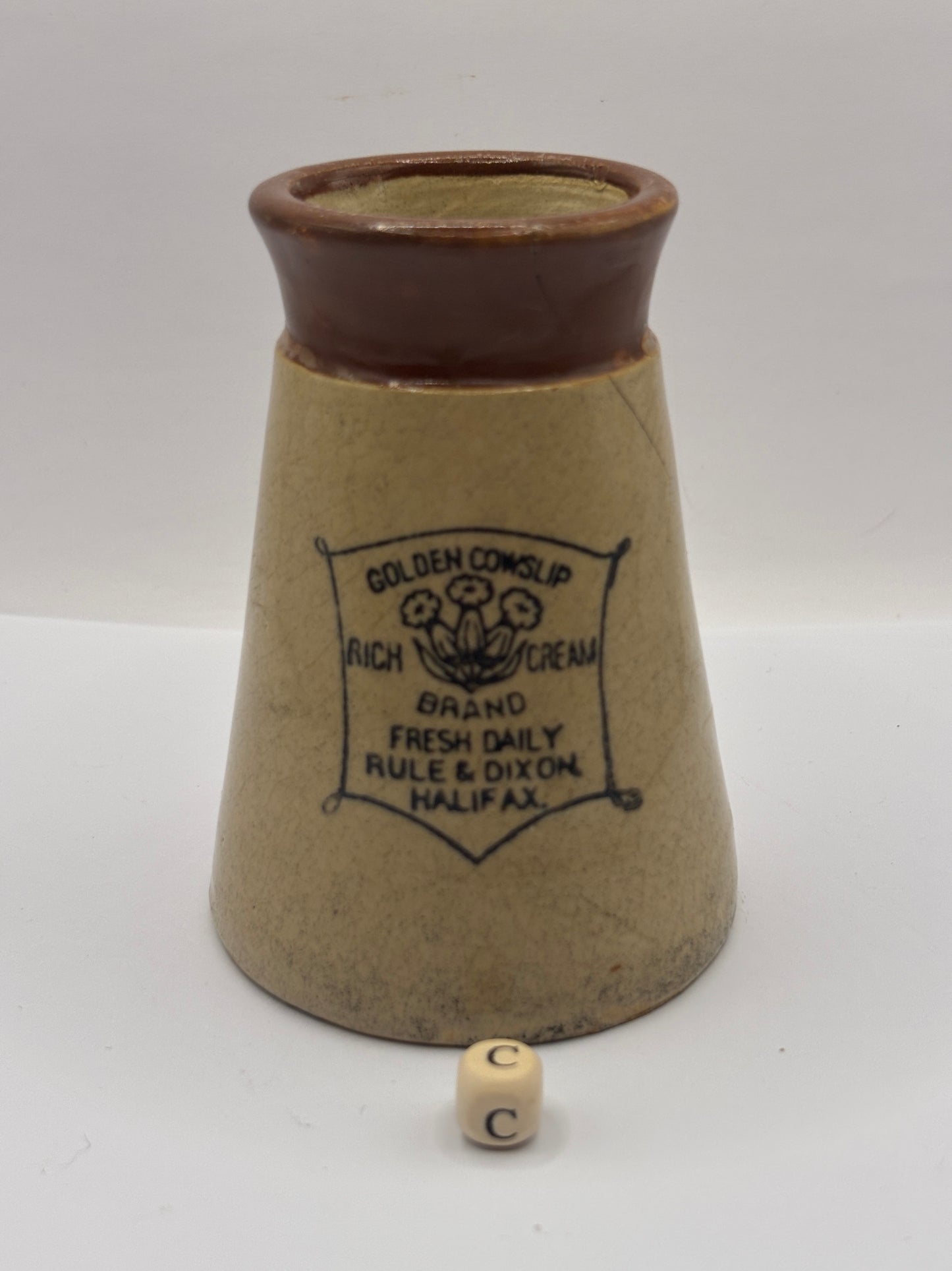 Old advertising cream pot, Cowslip (c) repaired/damaged