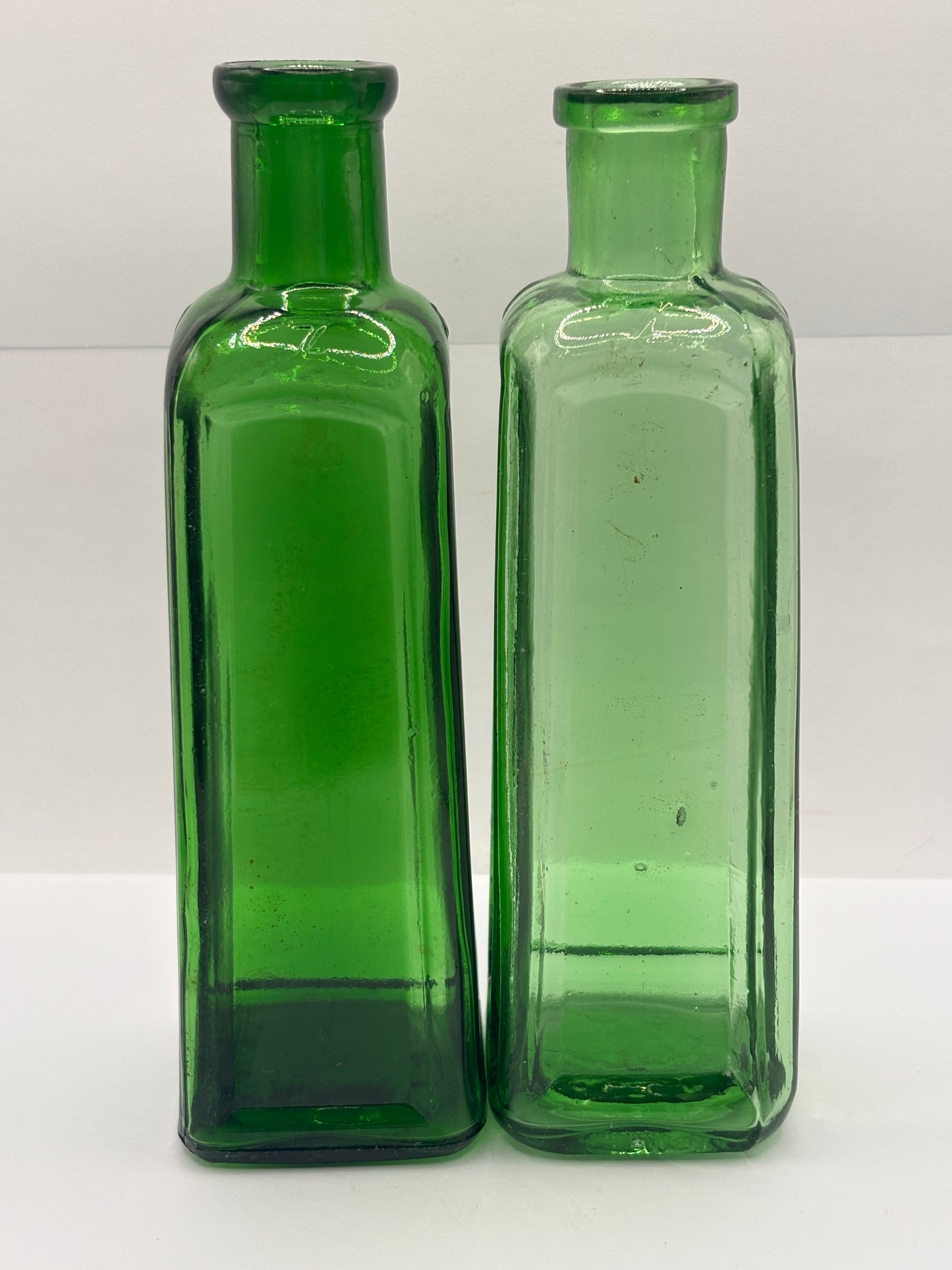 2 old green glass IZAL bottles