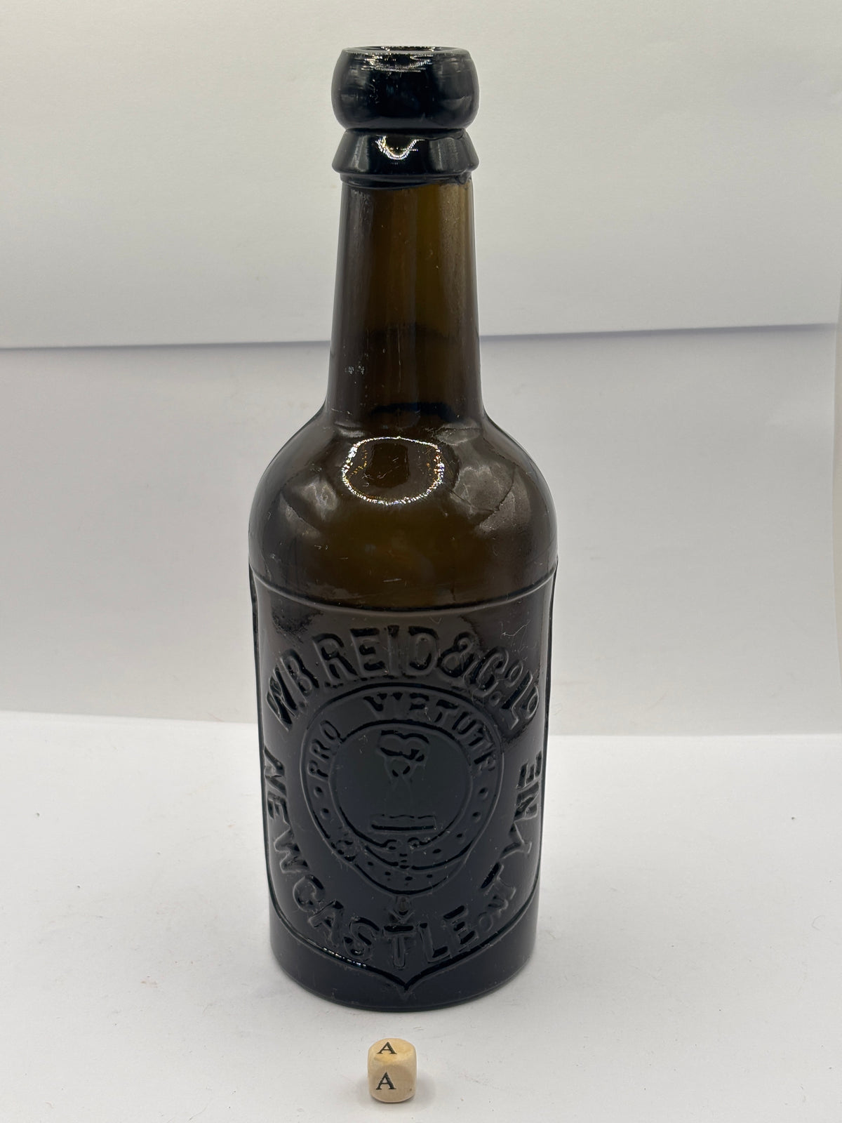 Old advertising beer bottle, WB Reid & Co Newcastle