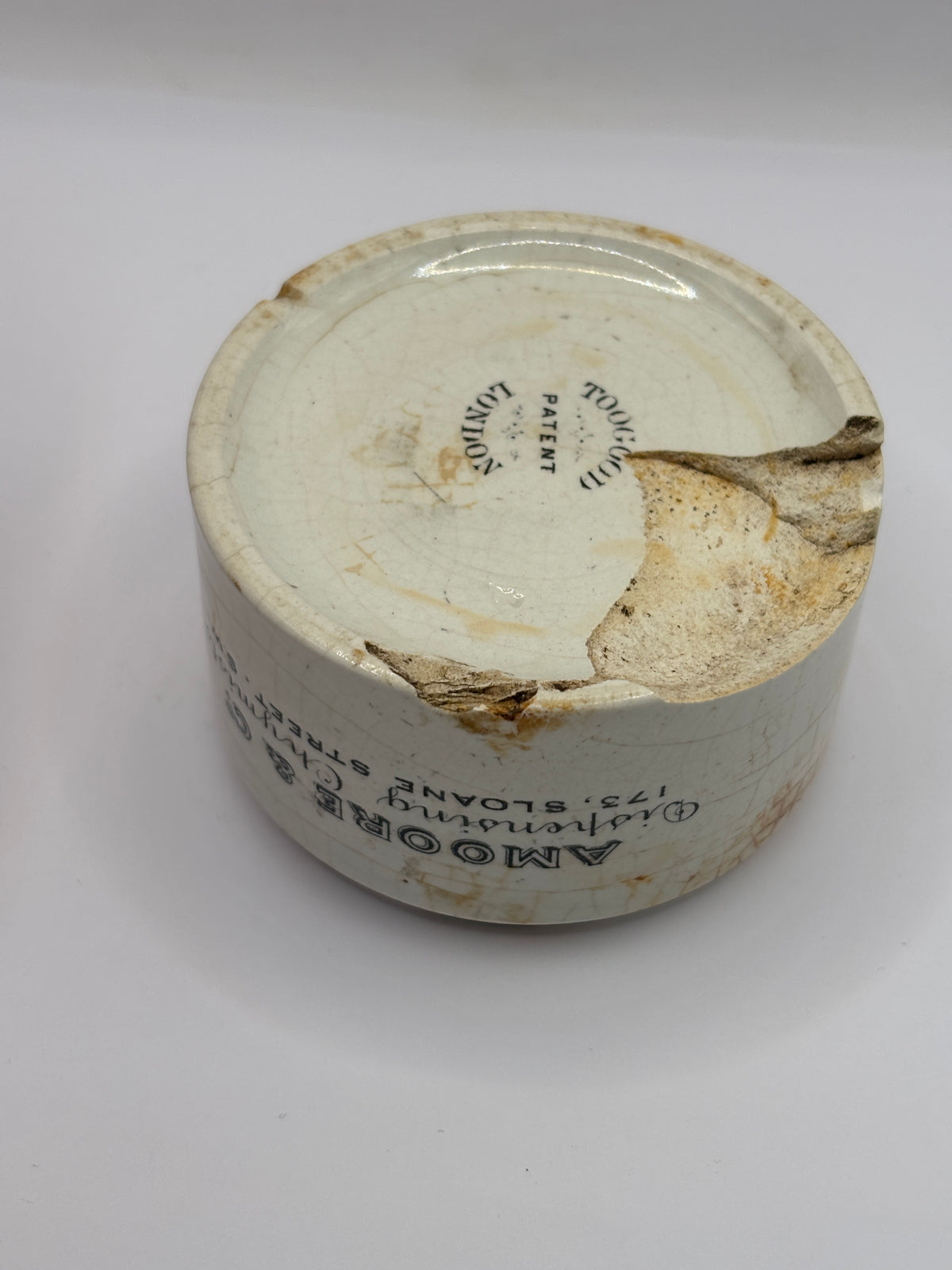 Old advertising base, amoore & Co dispensing chymists. Damaged