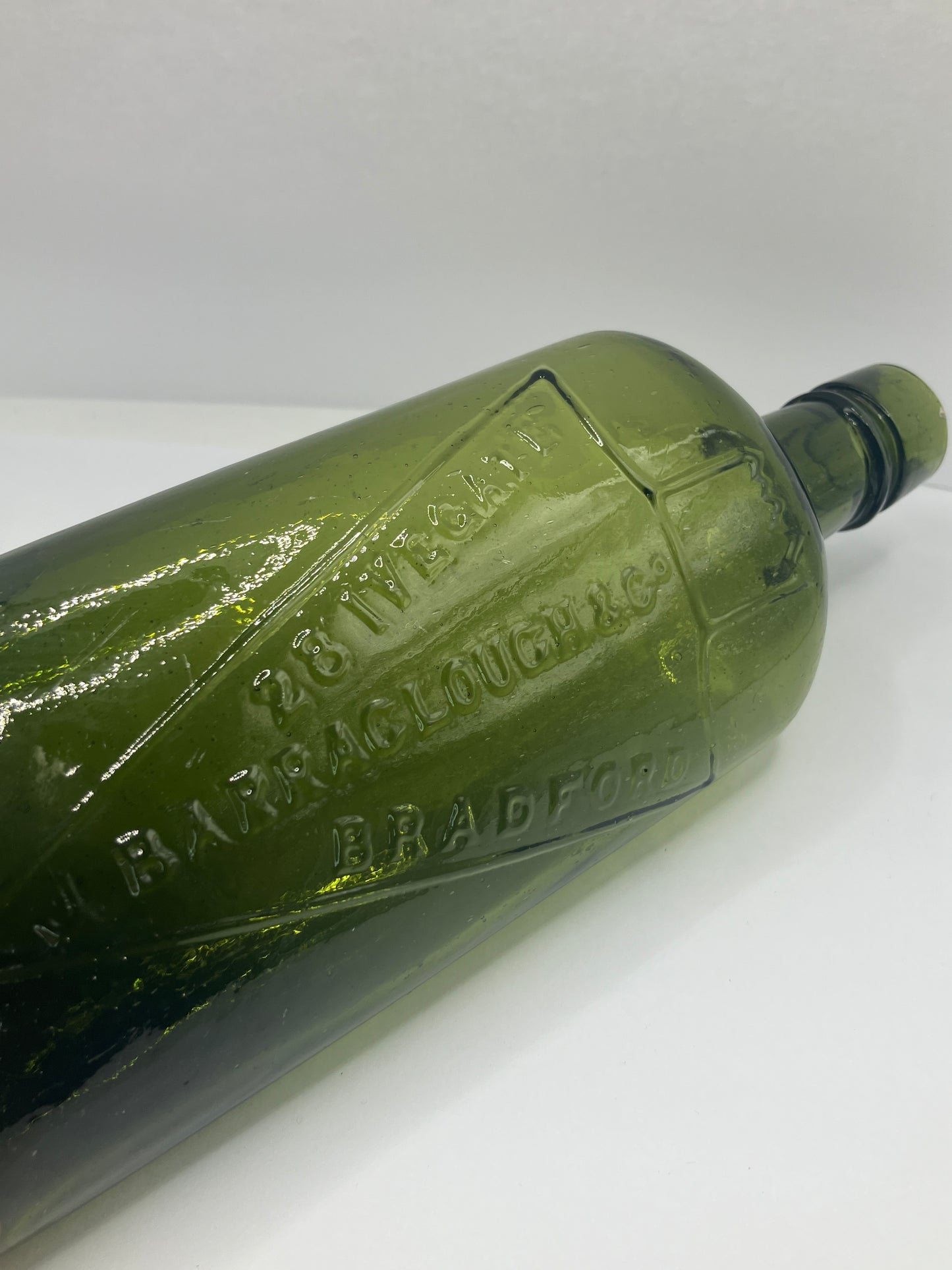 Dark green Bradford chemist bottle