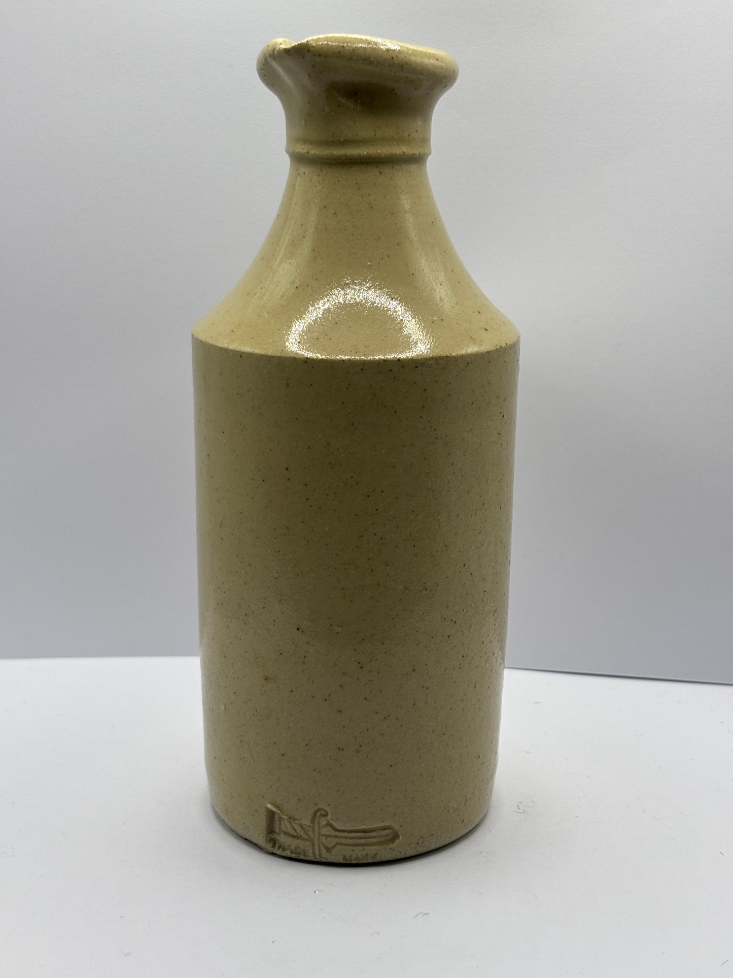 Tall stoneware ink with trade mark, FM & Co