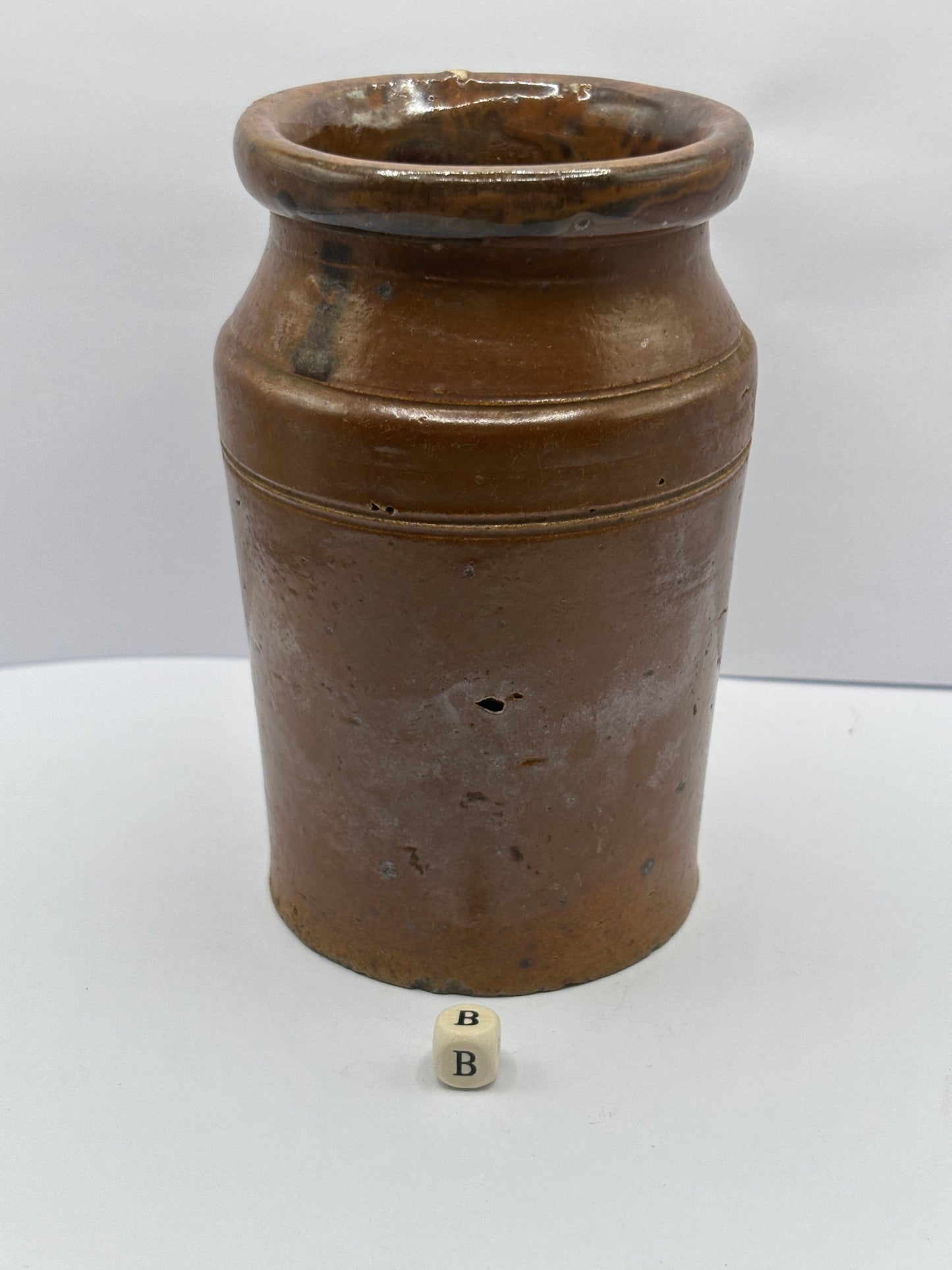 Old brown stoneware jar (B)