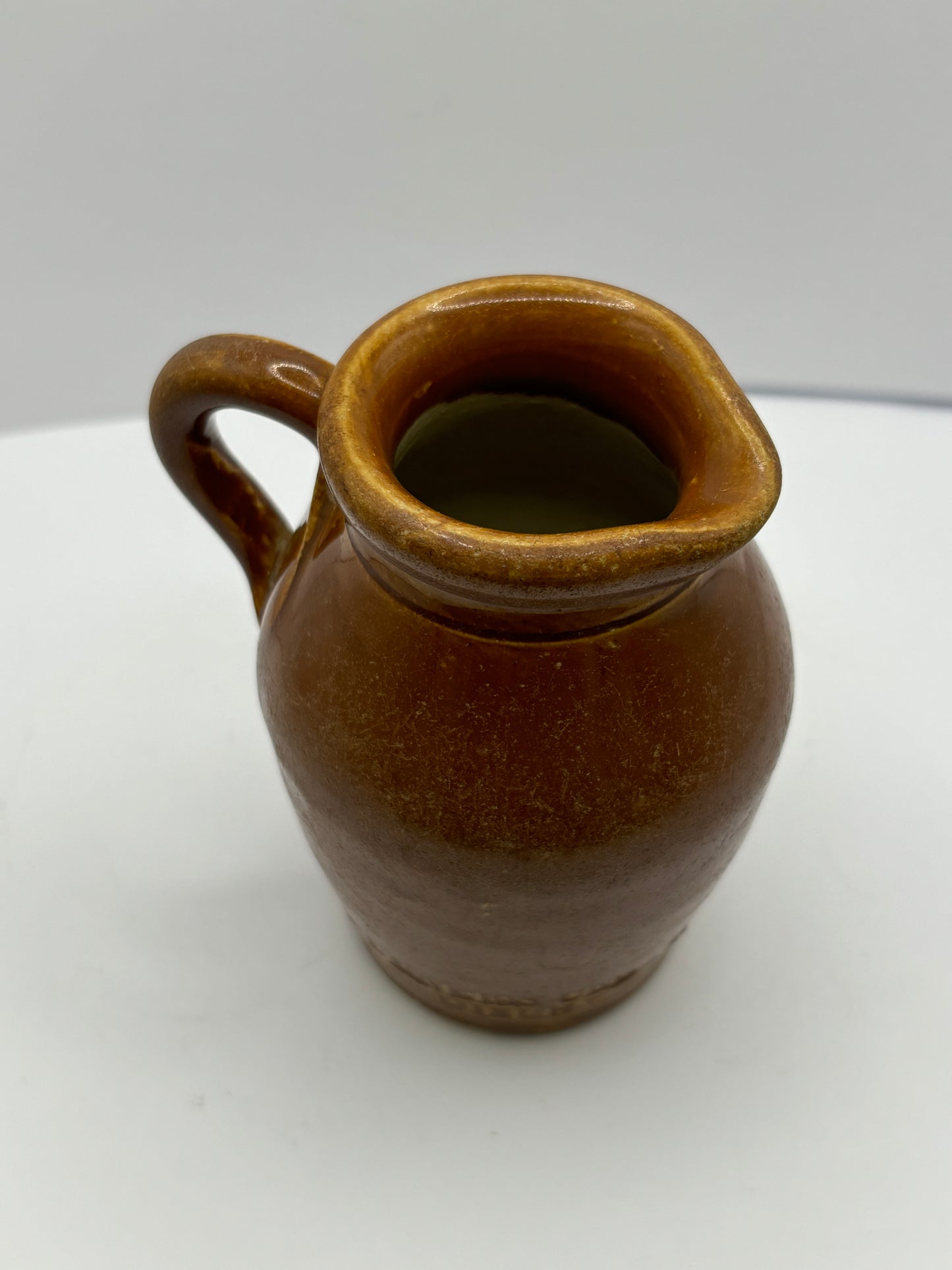 Old stoneware shop display cream pot. Turners cream Disley.