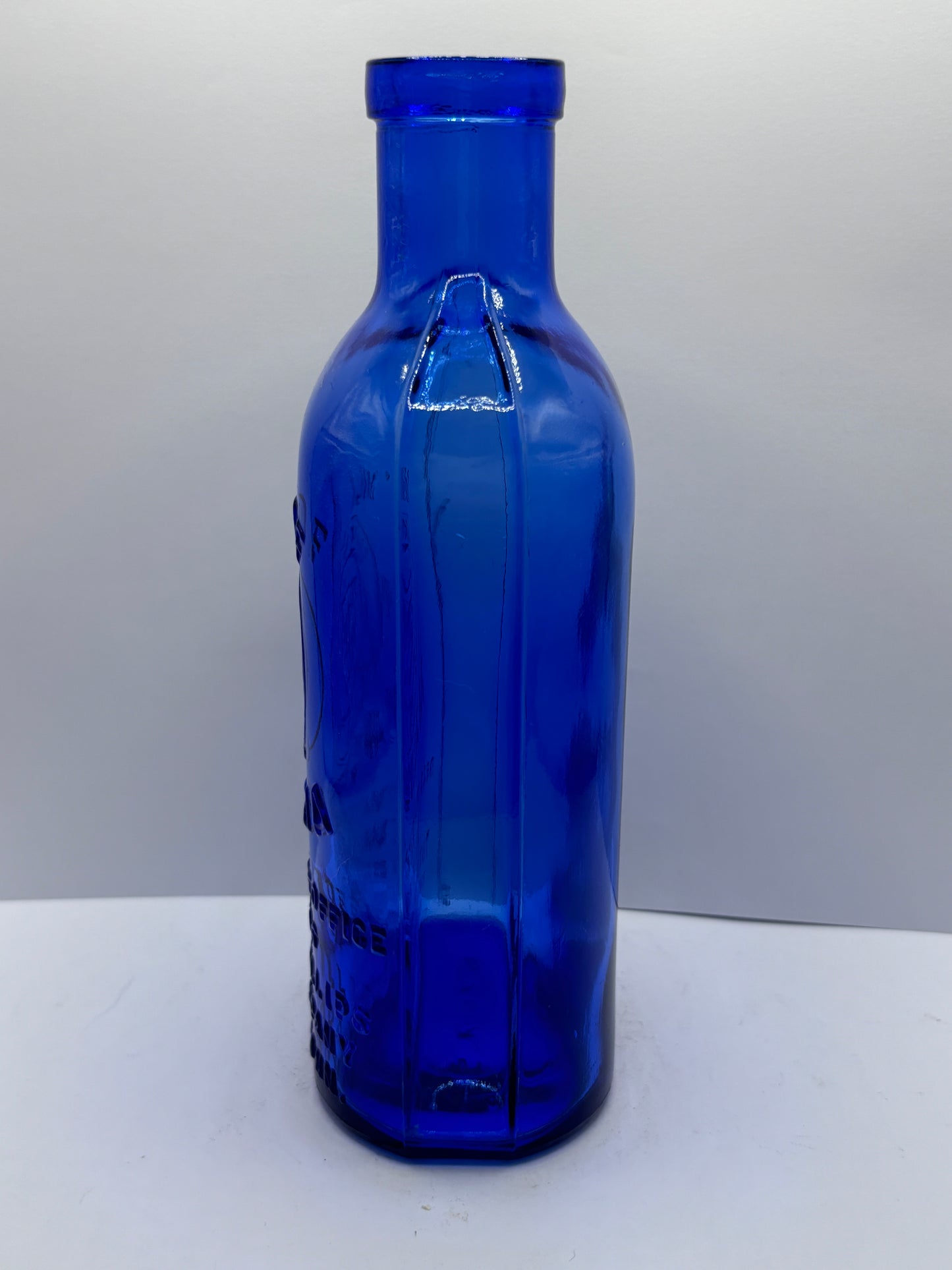 Old blue milk of magnesia bottle