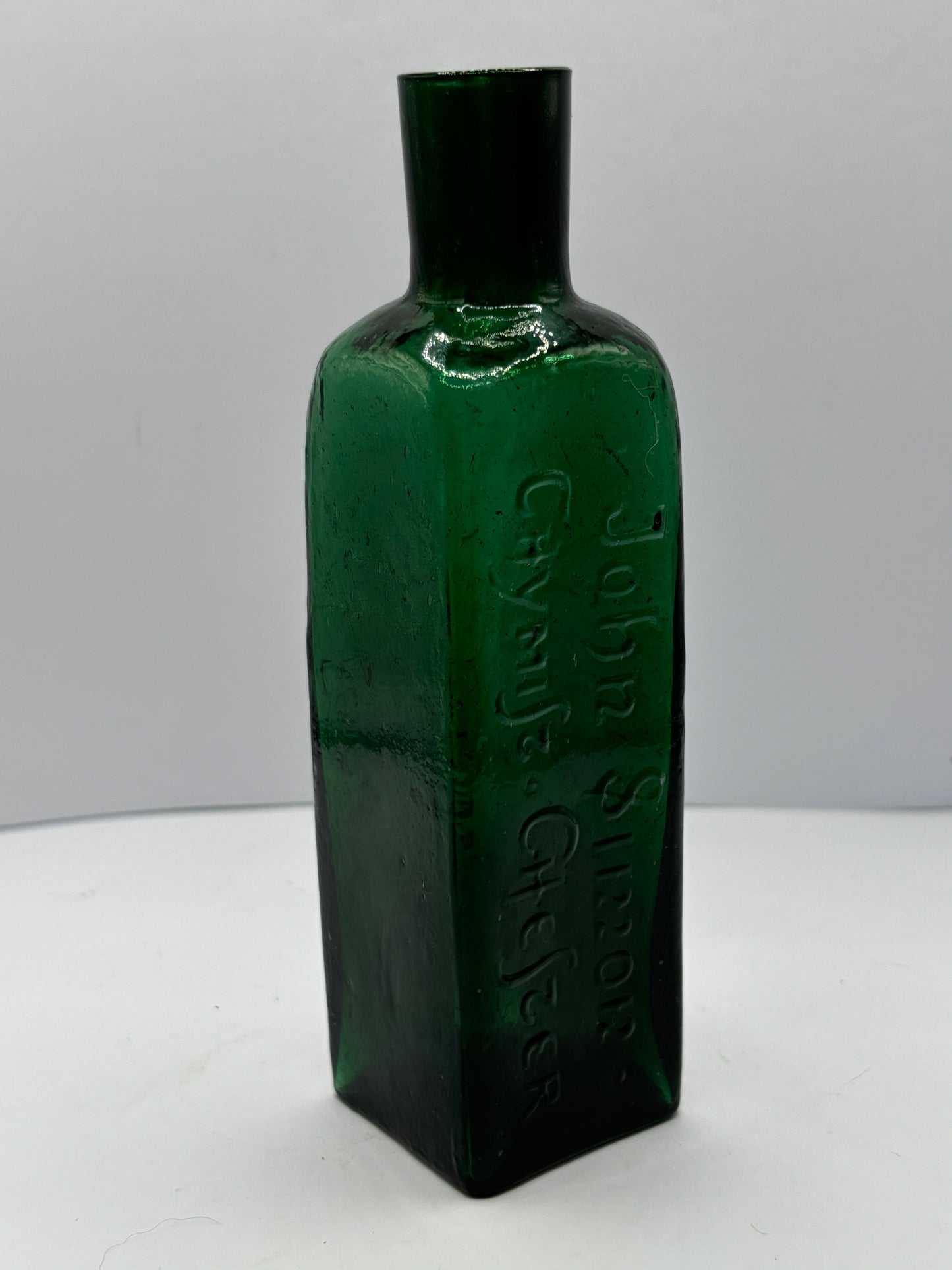 Old green advertising lavender water bottle, Ye far famed olde english lavender water