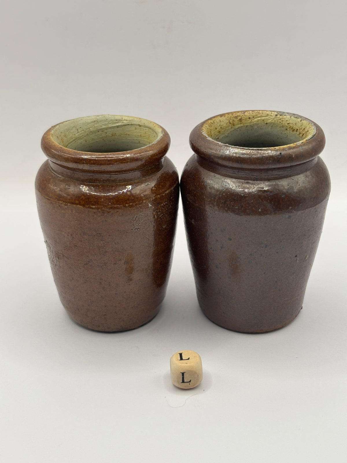 2 Old brown stoneware cream pots (L)