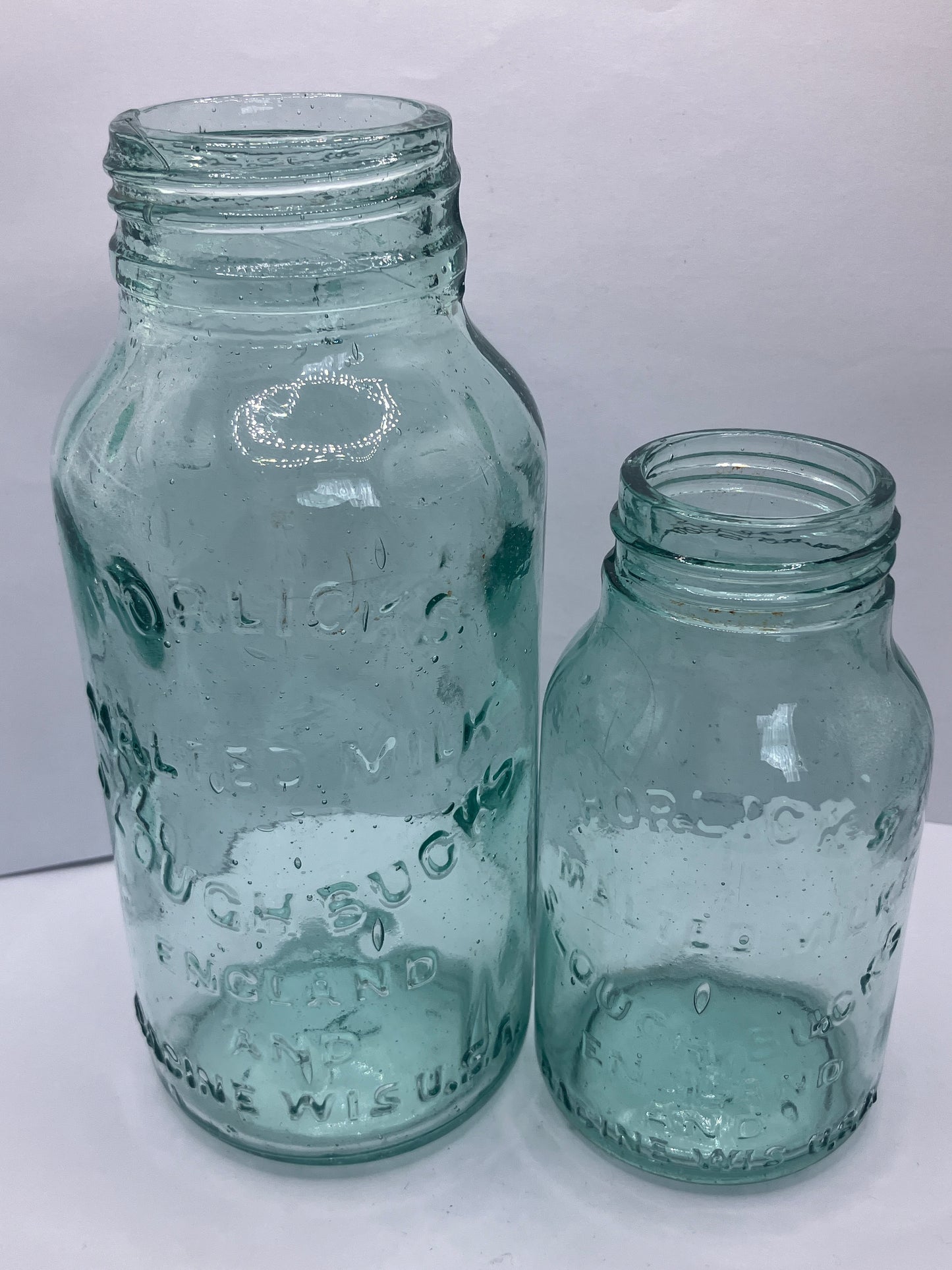 2 aqua glass advertising Horlicks  malted milk jars