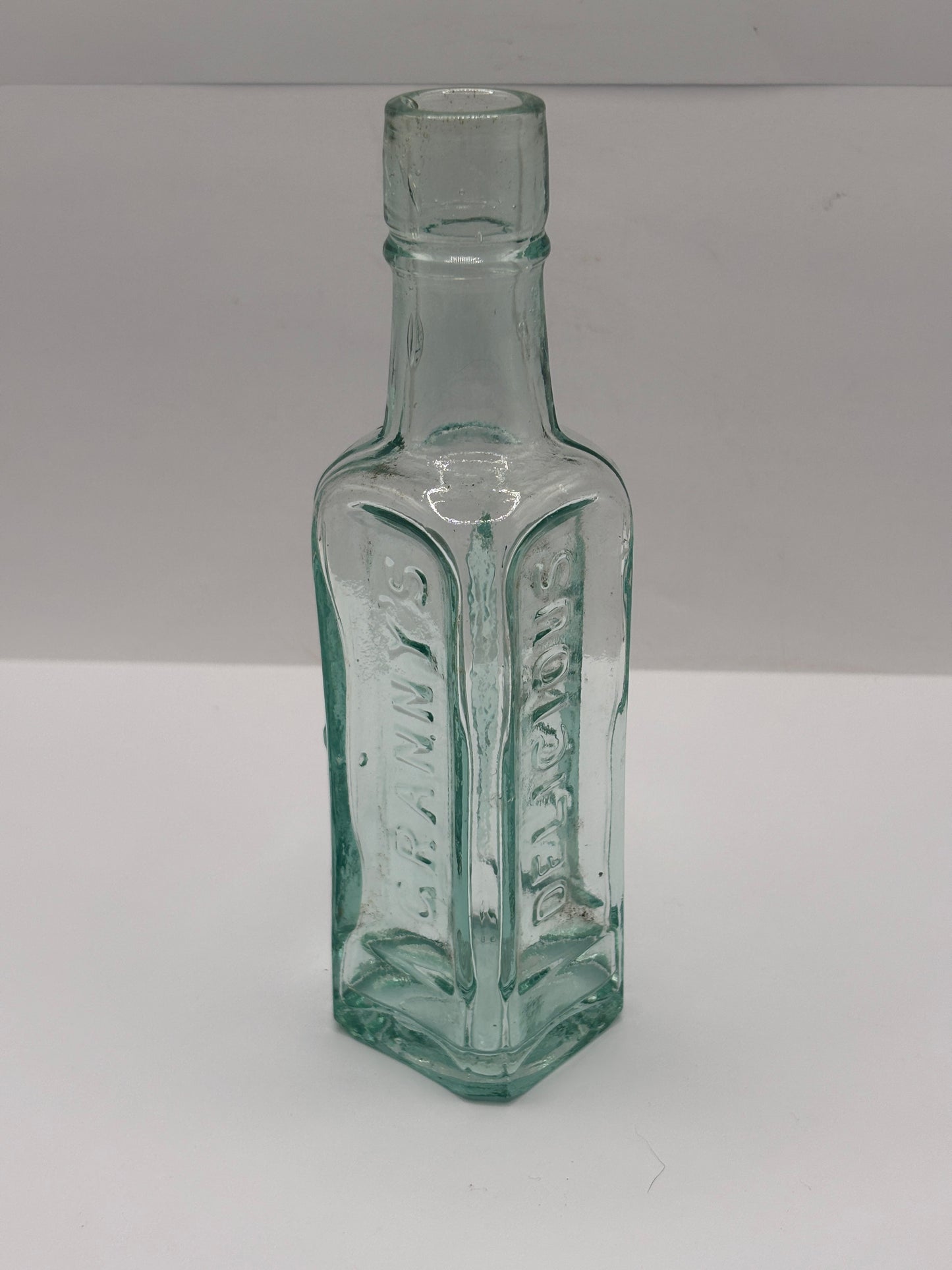 old aqua glass sauce bottle, Grannys delicious sauce