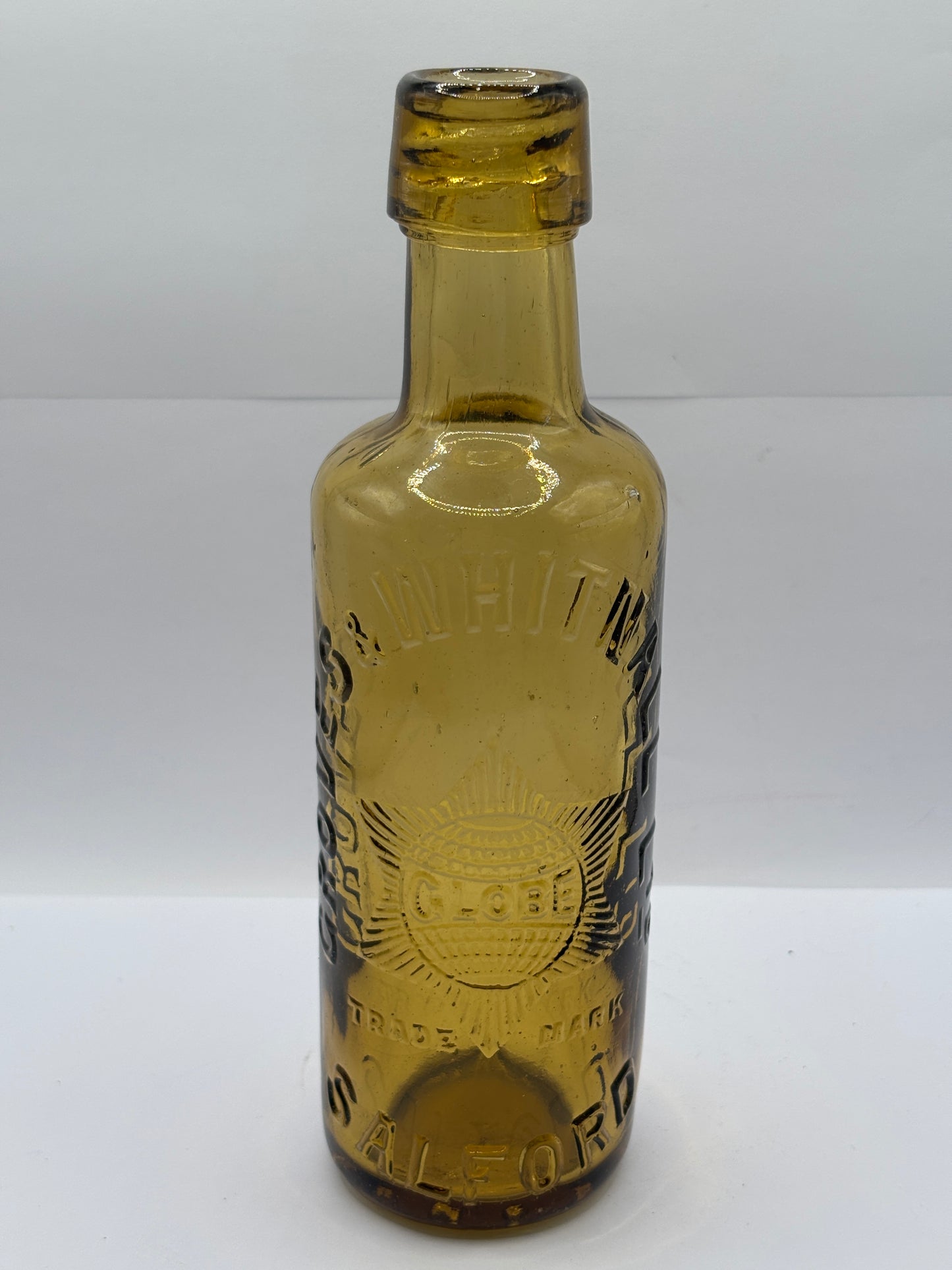 Old advertising amber glass beer bottle, Groves & Whitnall Salford