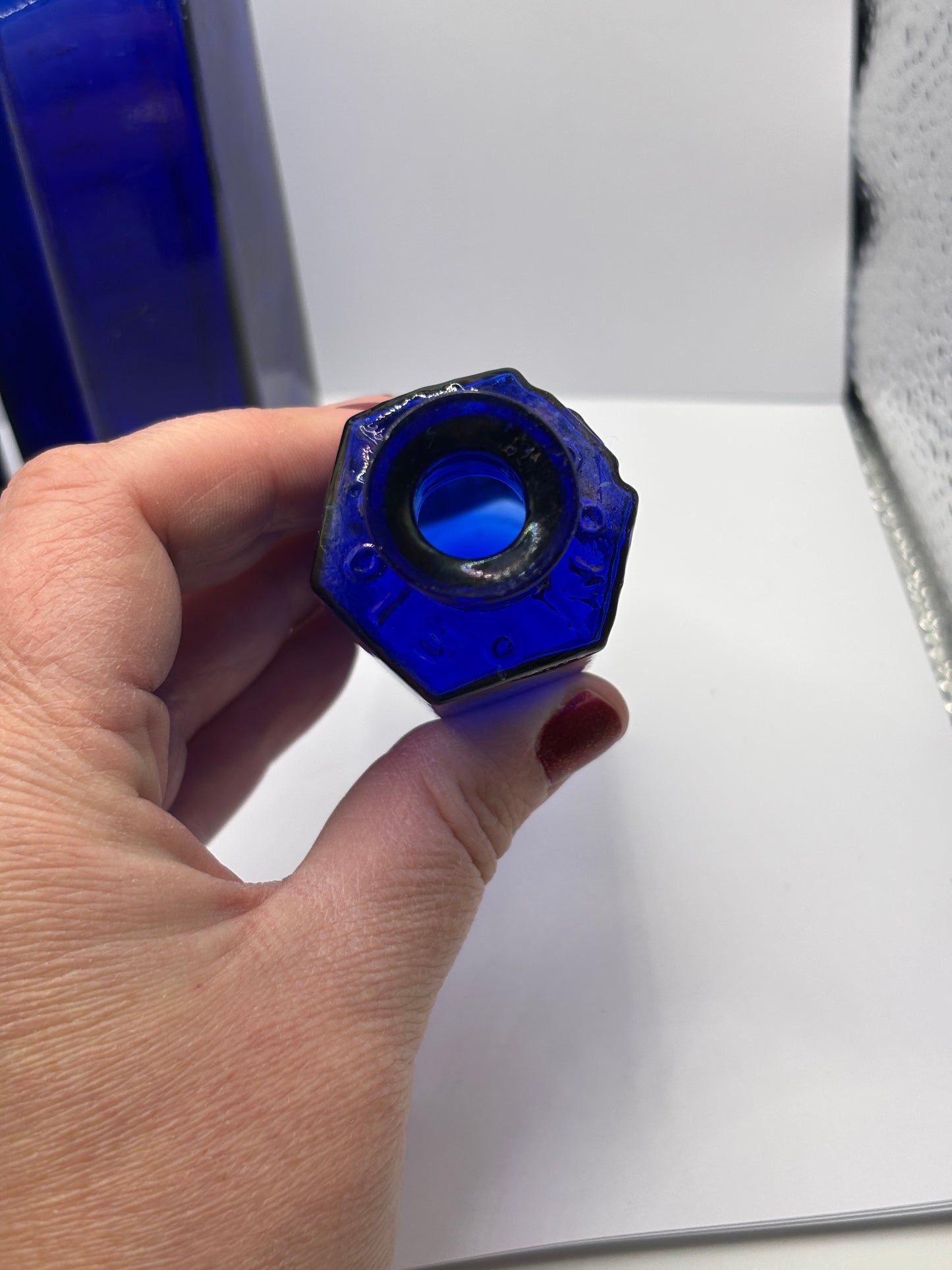 3 old blue poison bottles, not to be taken. Poisonous