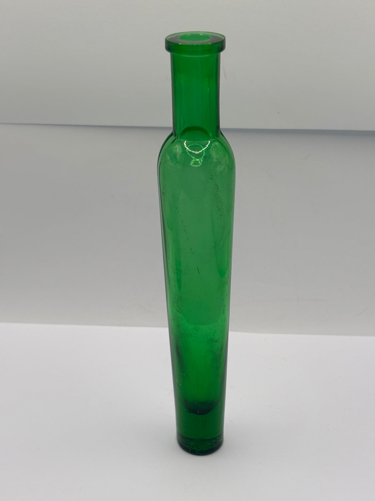 old tall green glass lavender water bottle