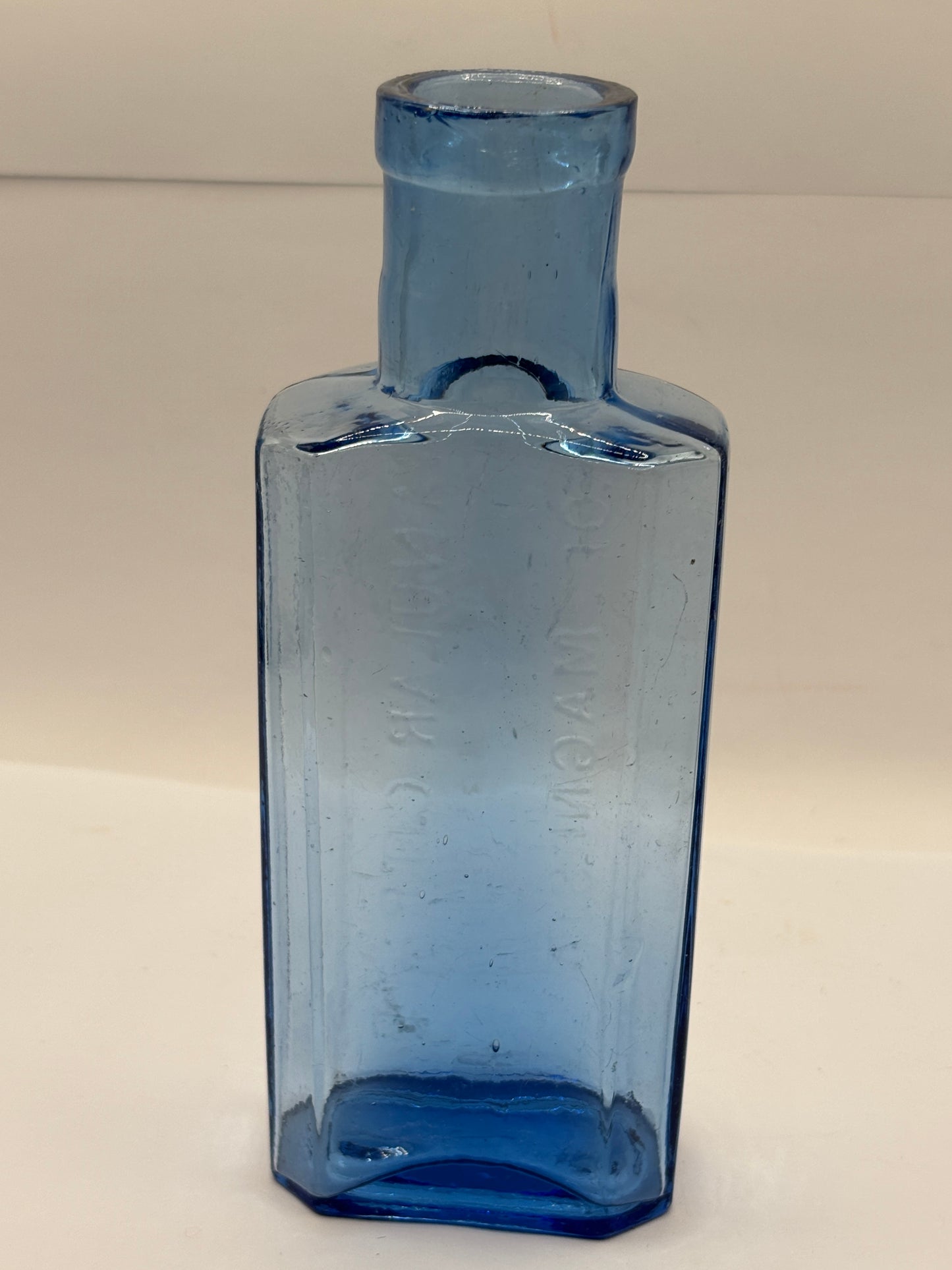 Old blue glass advertising chemist bottle, Granular citrate of magnesia