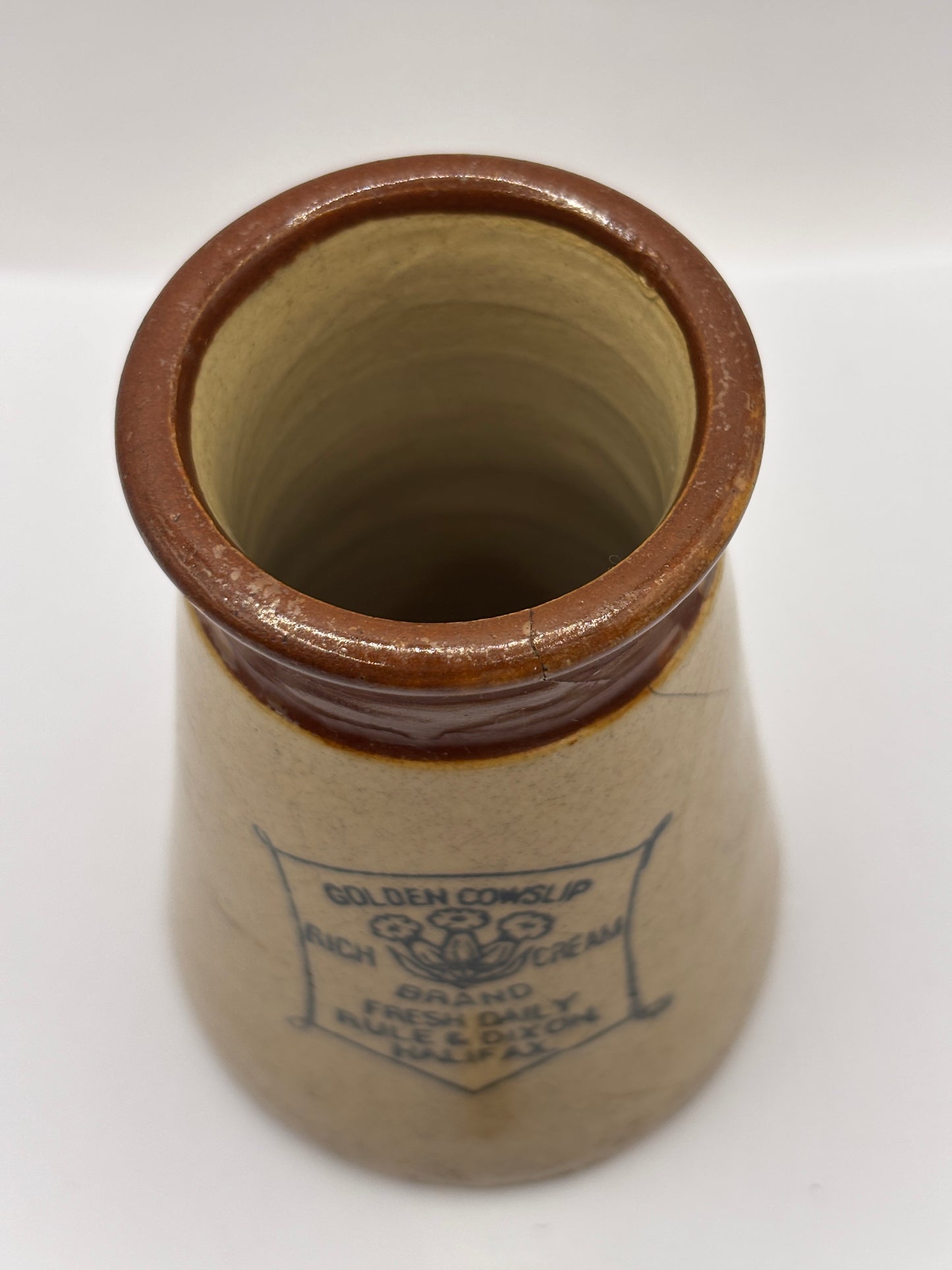 Old advertising cream pot, Cowslip (c) repaired/damaged