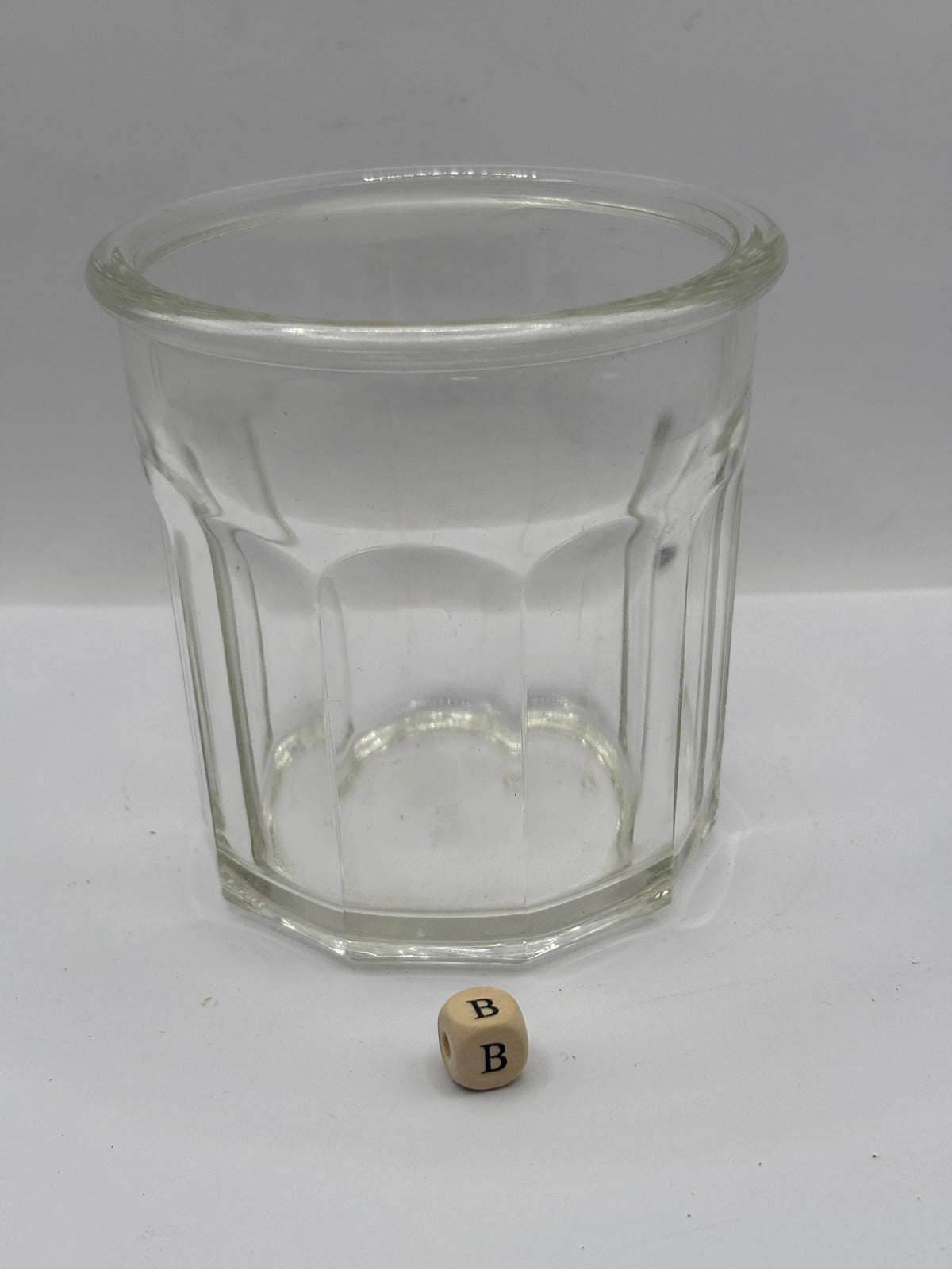 Old clear glass French jam jar (B)