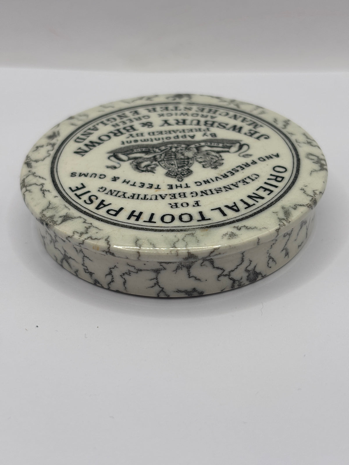 Old advertising lid. Oriental tooth paste Jewsbury & Brown