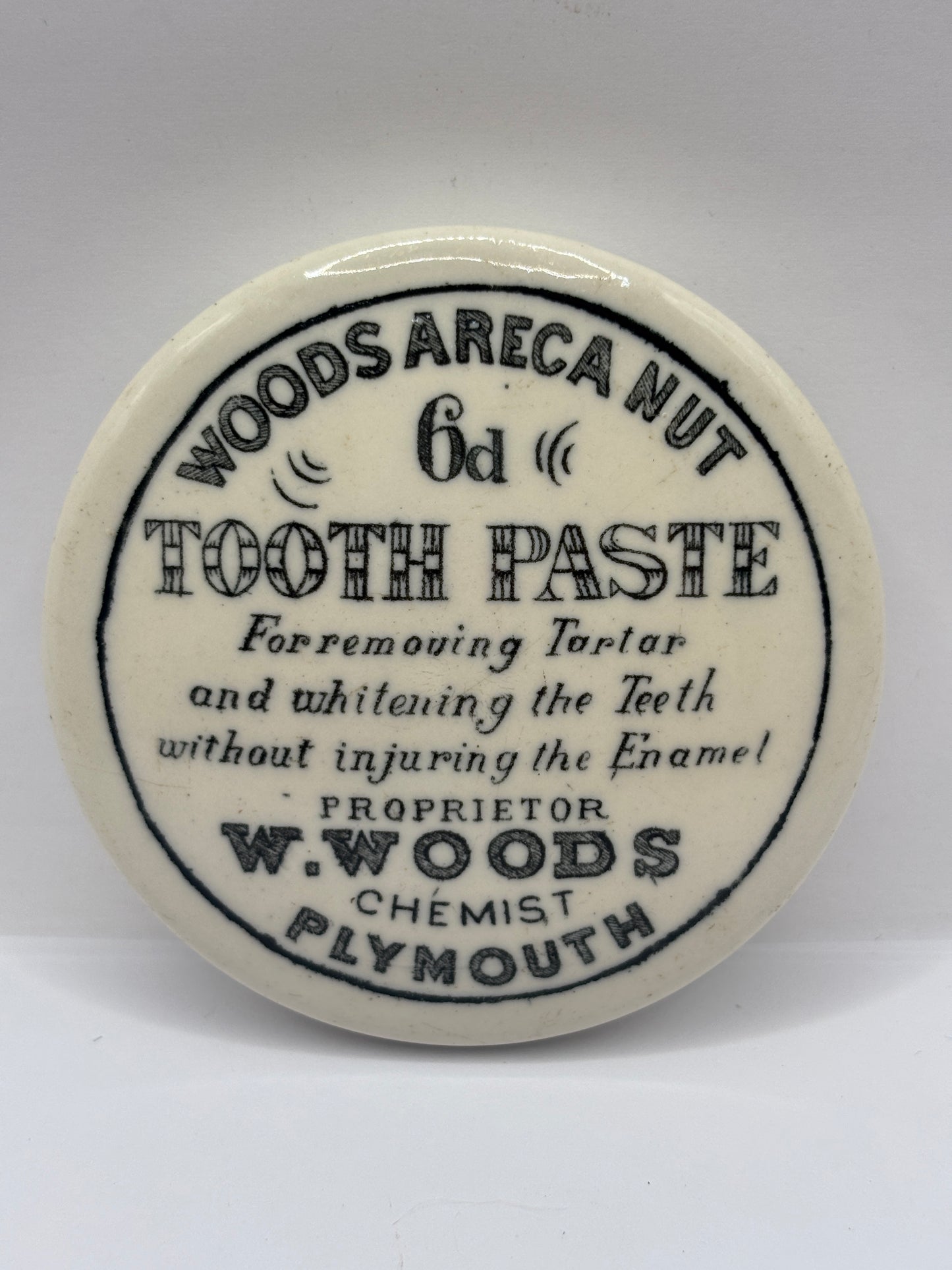 old advertising lid, Woods areca nut toothpaste (a)