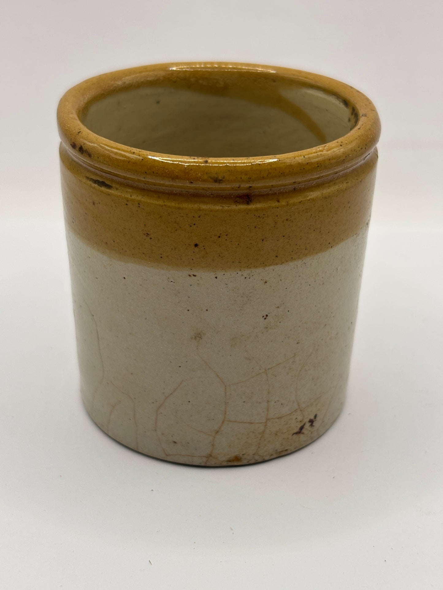 Old small brown top stoneware jar