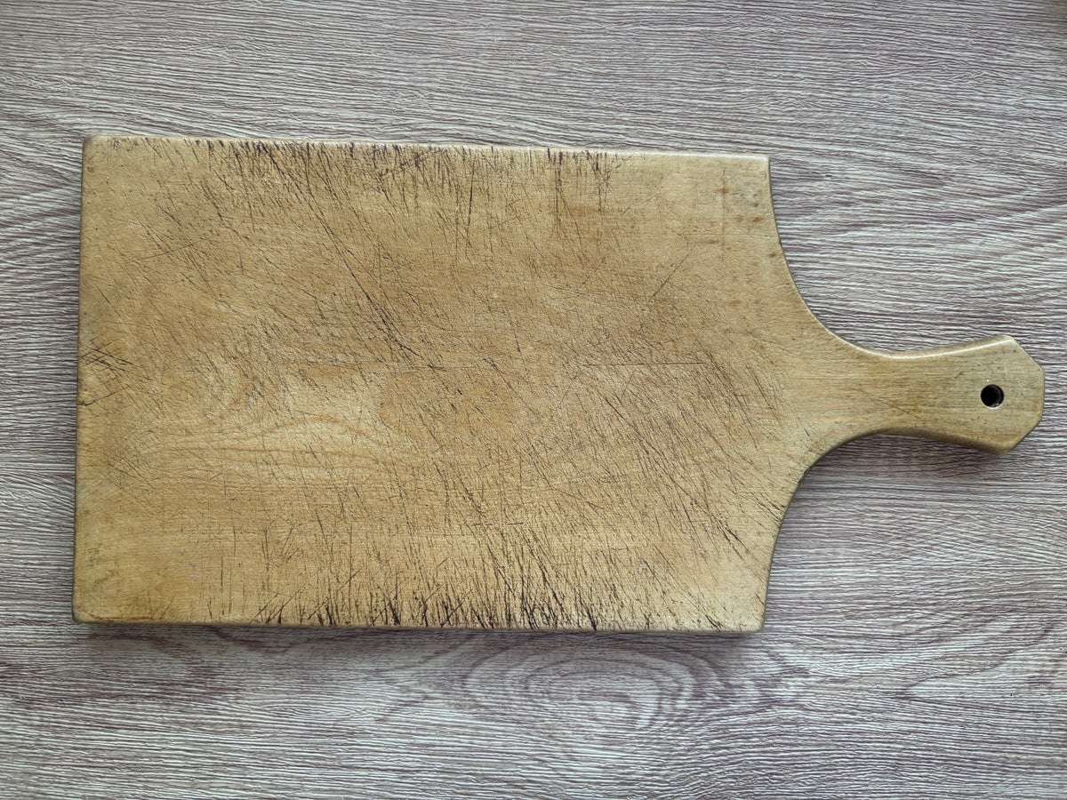 Old wooden cheese board