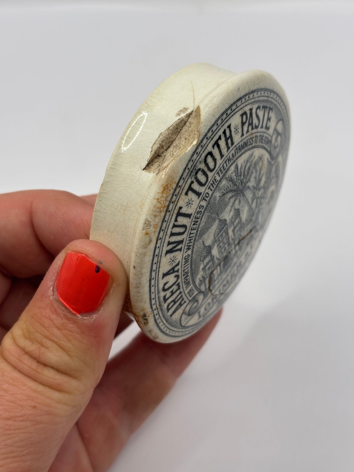 Old advertising lid, Lorimer & Co Areca nut tooth paste. Damaged
