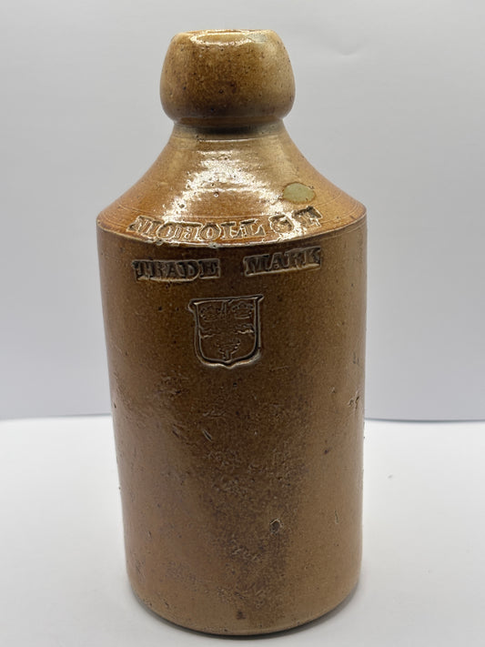 Old Colchester impressed ginger beer bottle, Nicholl & co