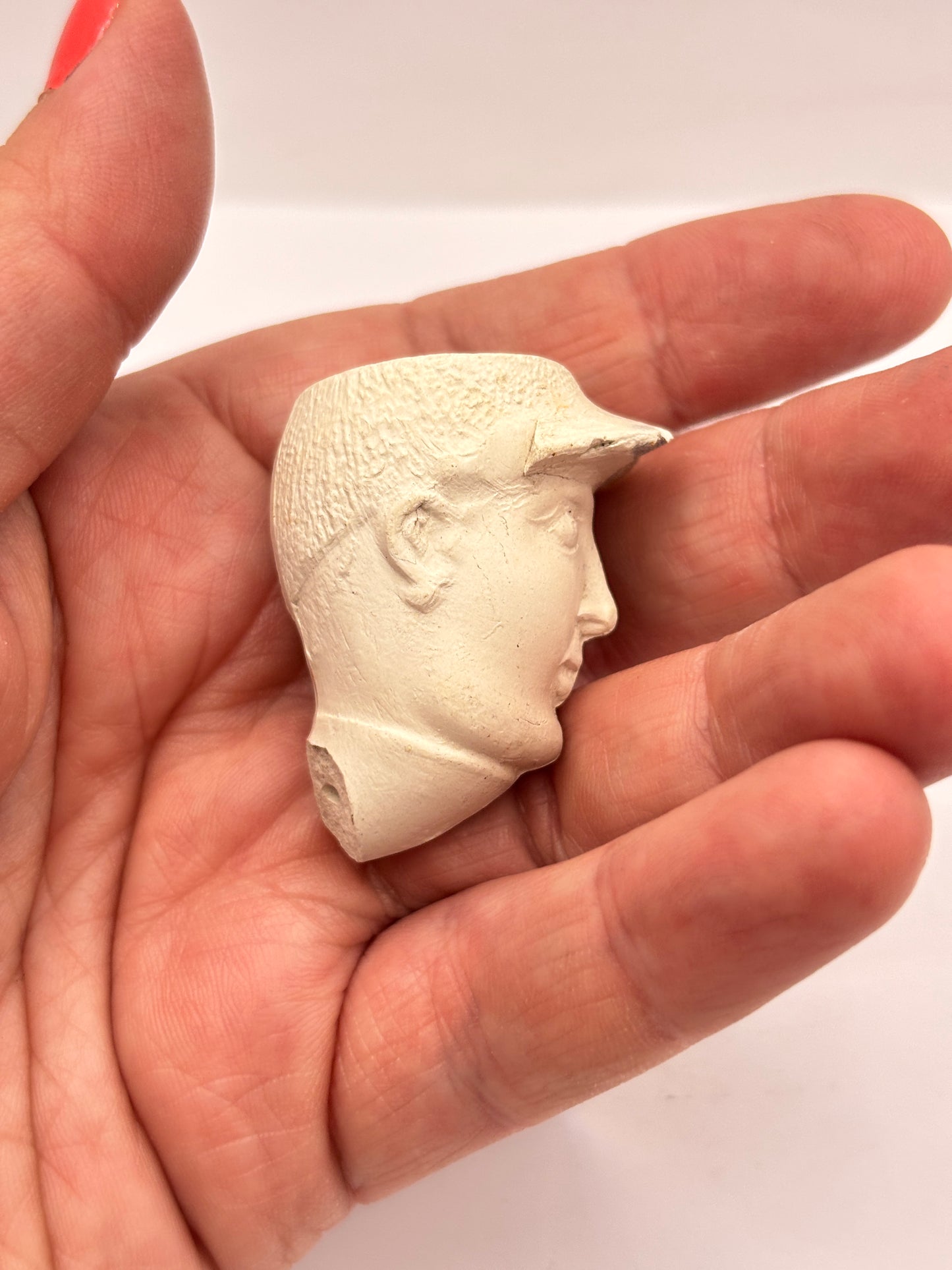 Old figural clay pipe head, pipe bowl