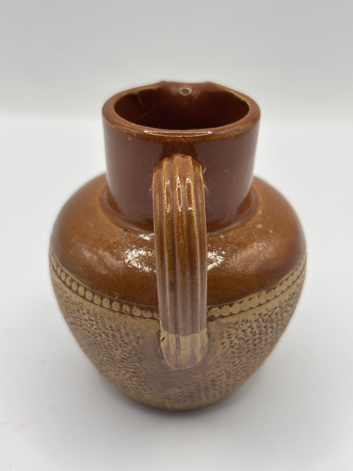 Old mini stoneware handled jug