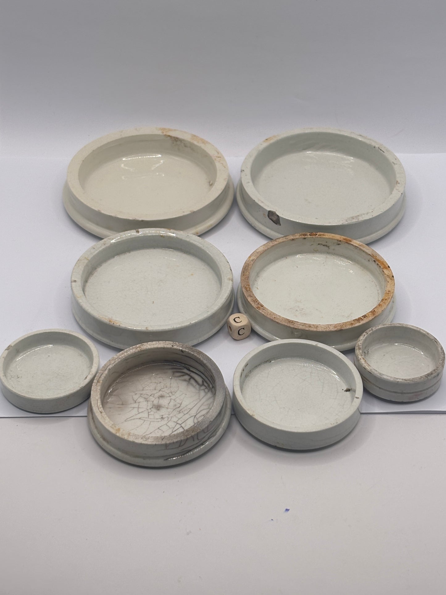 8 old plain stoneware lids, stacking lids (c)