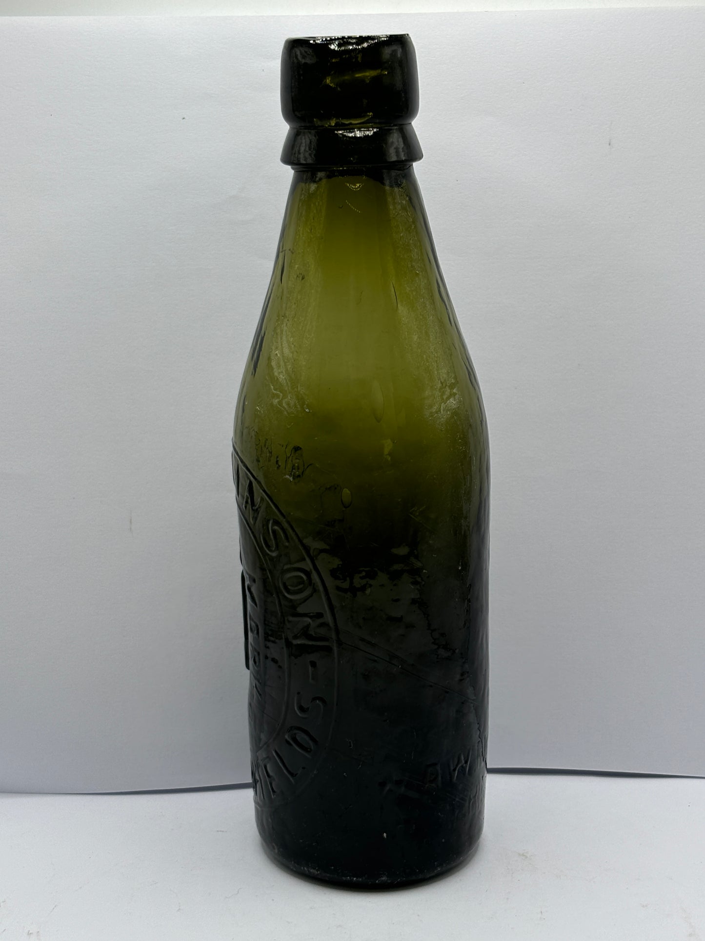 Old green glass North Sheilds beer bottle