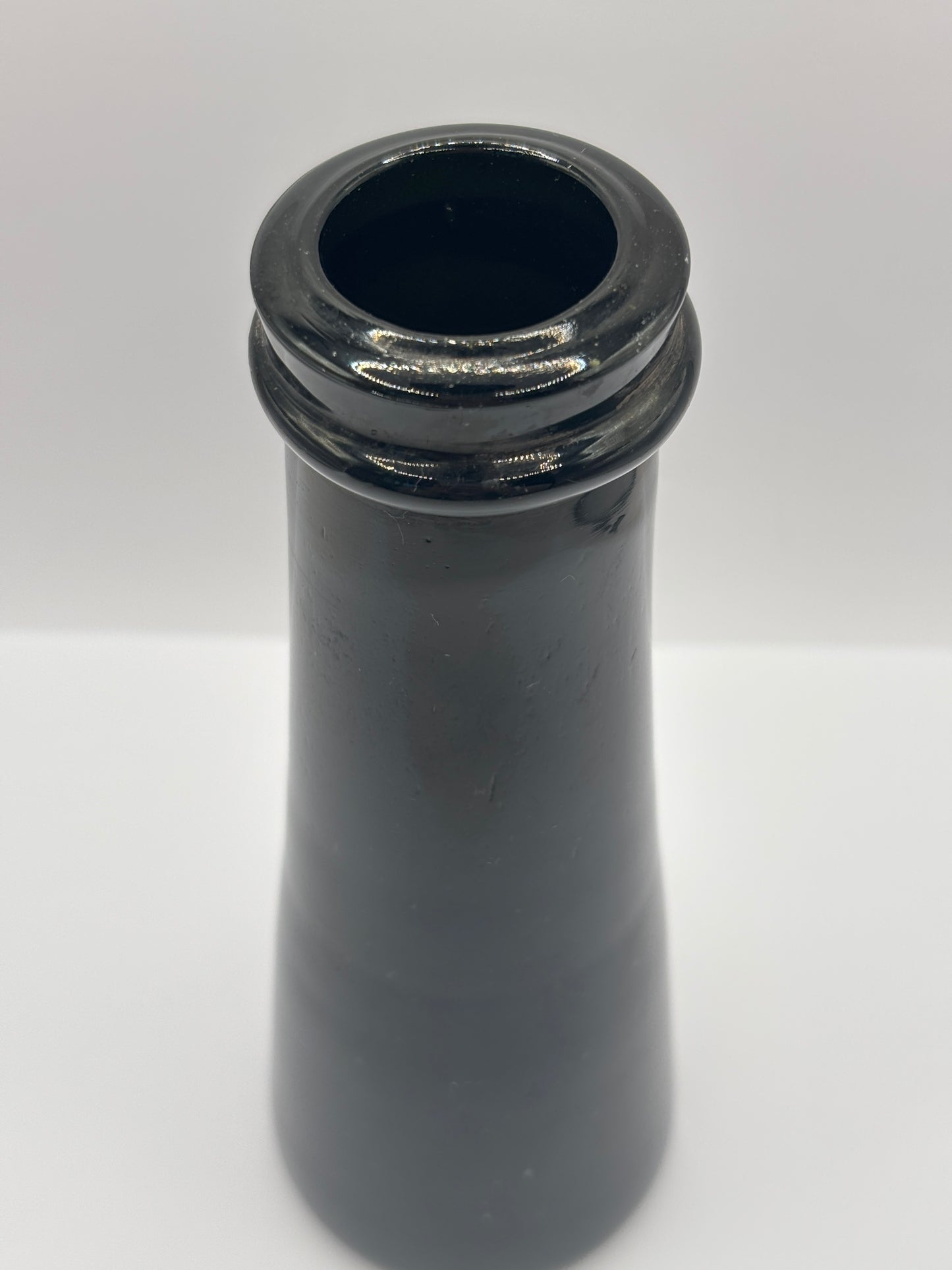 Old black glass truffle jar