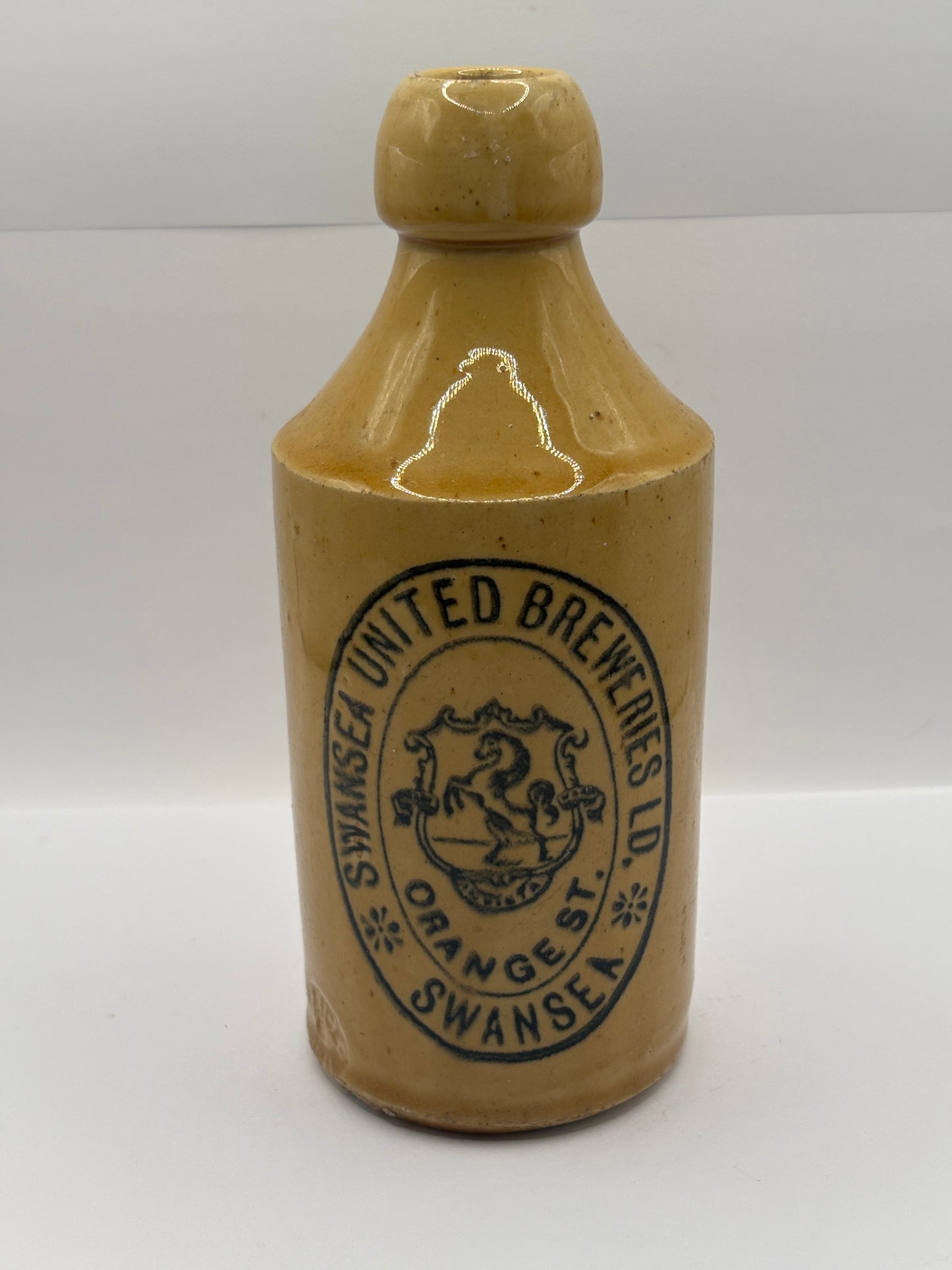 Old stoneware ginger beer bottle, Swansea united Breweries