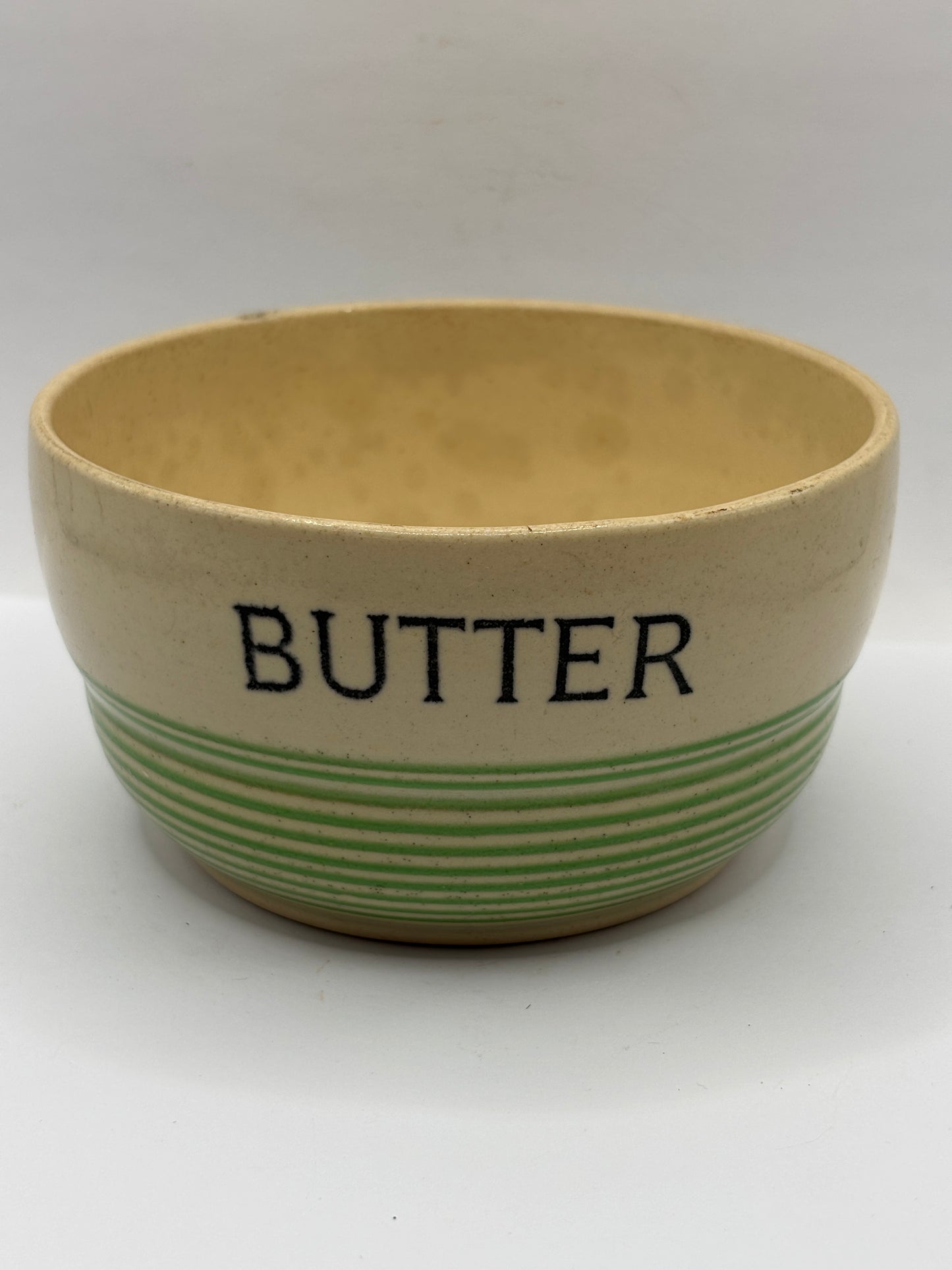 Old stoneware butter dish, no lid. Stained