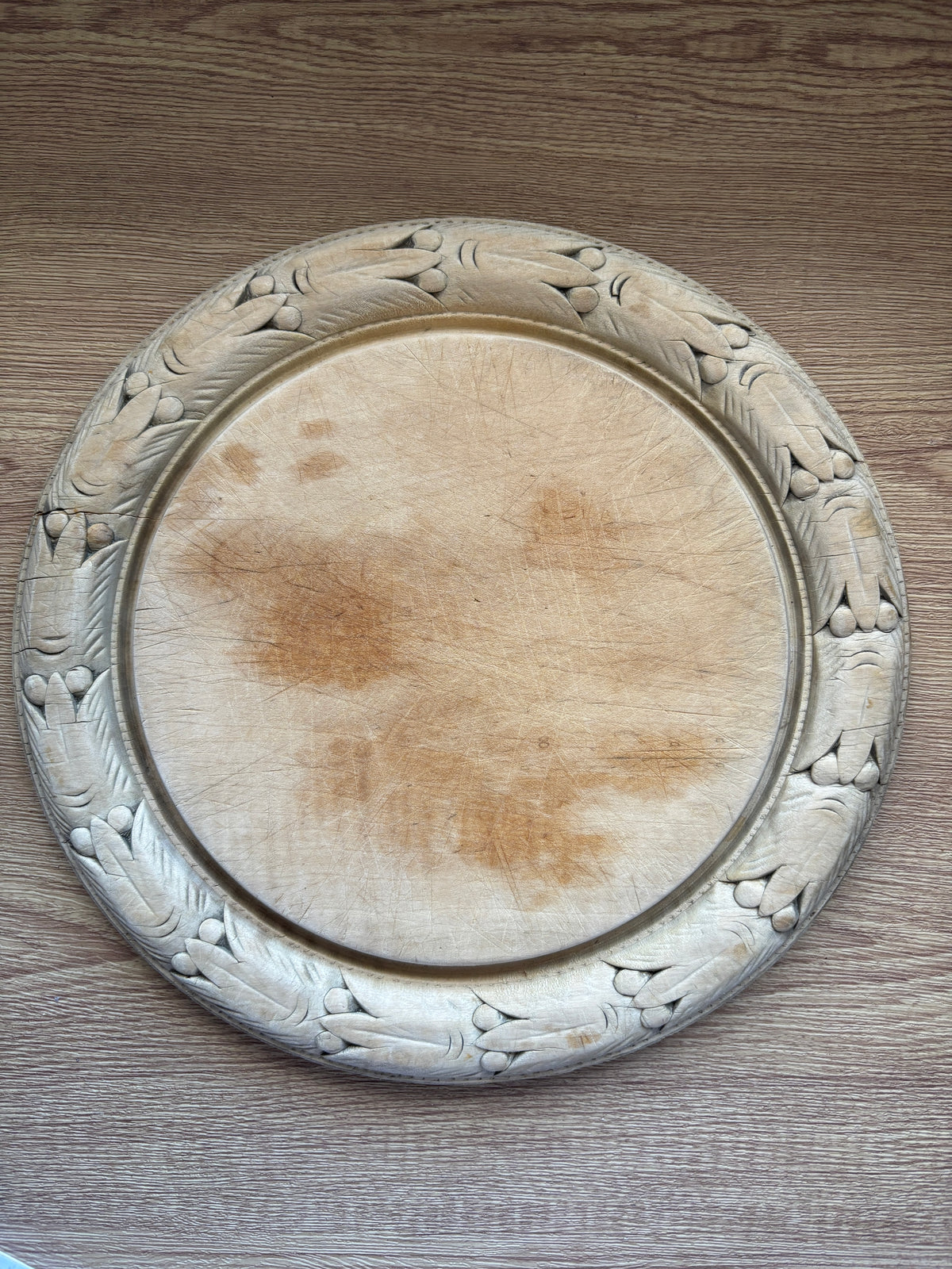 Old wooden carved bread board