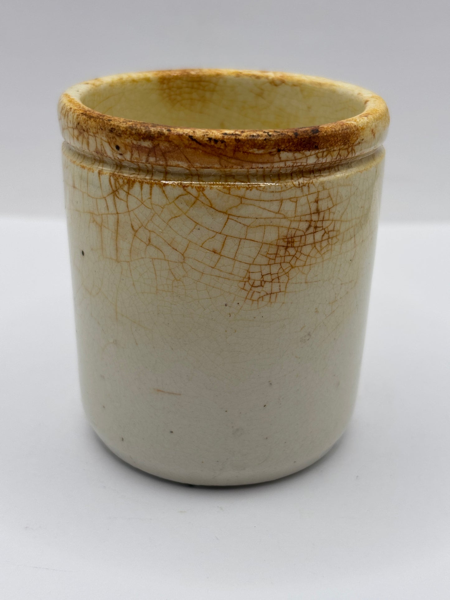 Old white stoneware jar