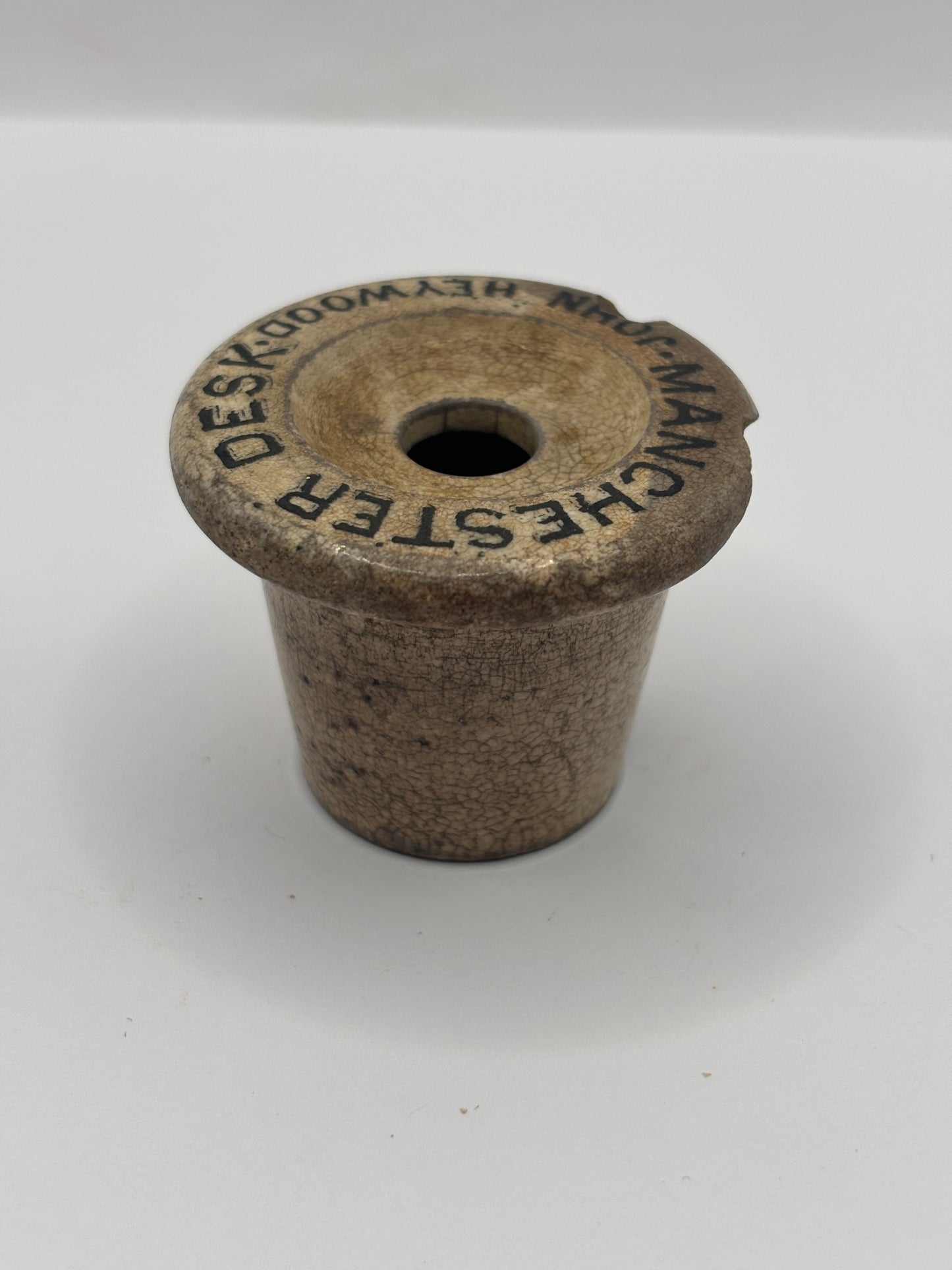 Old advertising stoneware desk inkwell, Manchester. Damaged