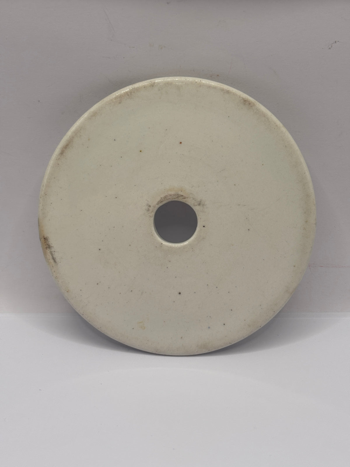 Old ironstone plug strainer