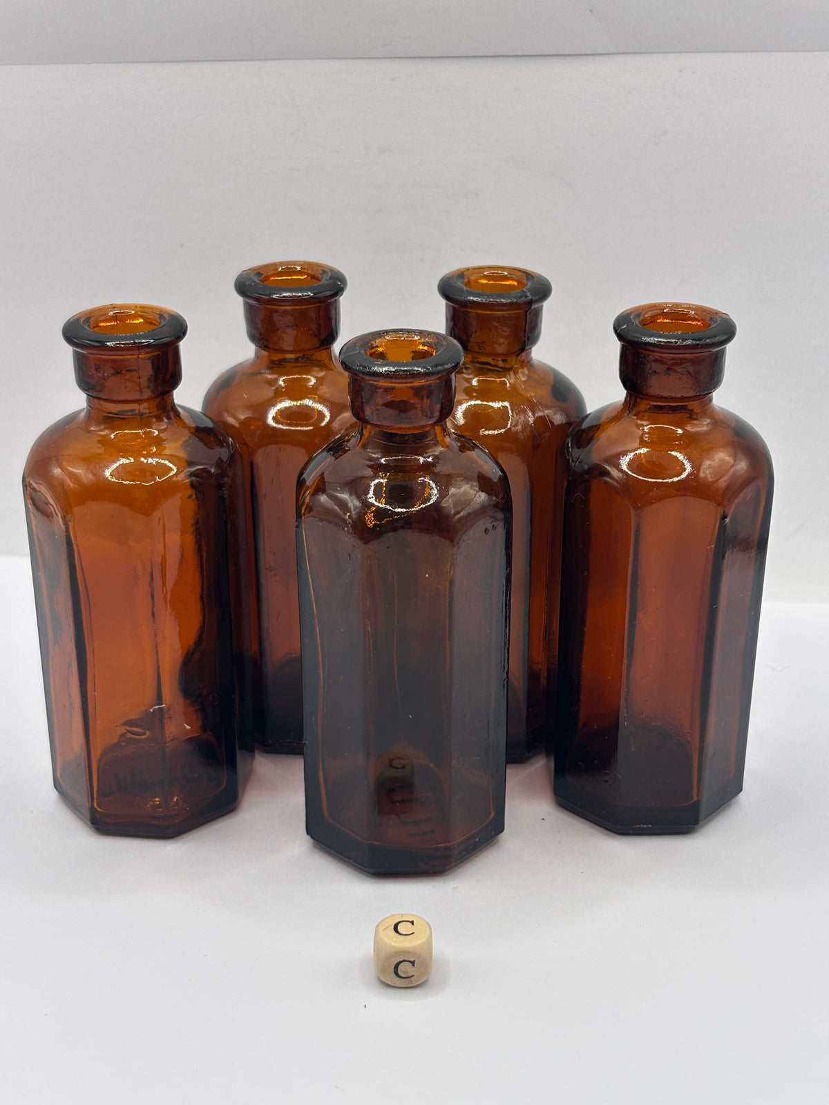 5 Old amber glass medicine bottles (C)
