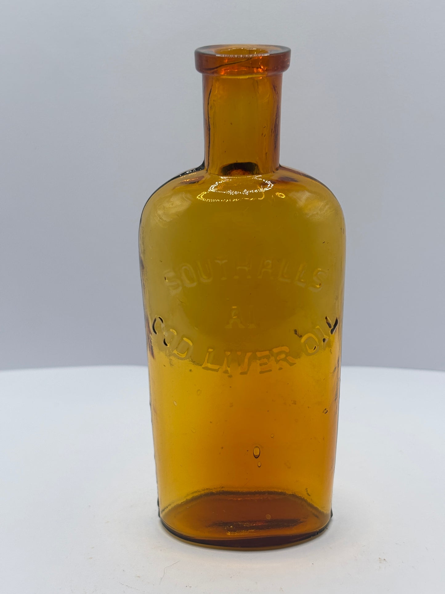 Old amber cod liver oil bottle