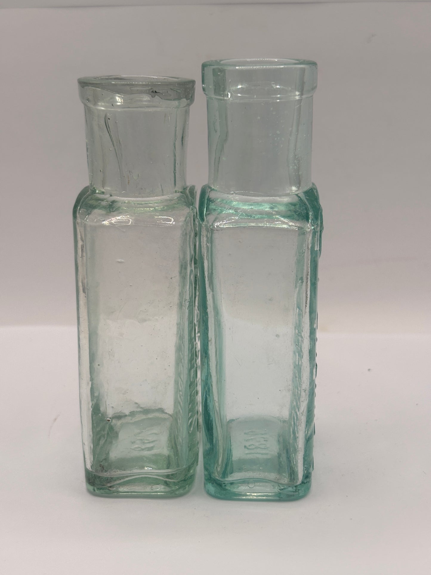 2 Old glass Boots cash chemists bottles