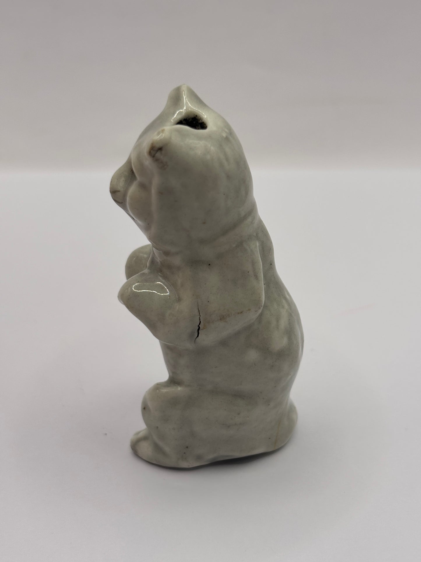 Old stoneware cat decoration