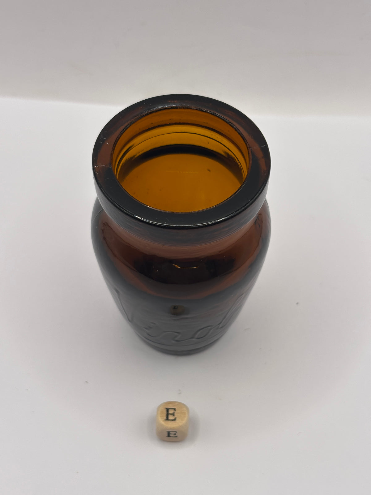Old amber glass Virol jar (e) 8cms