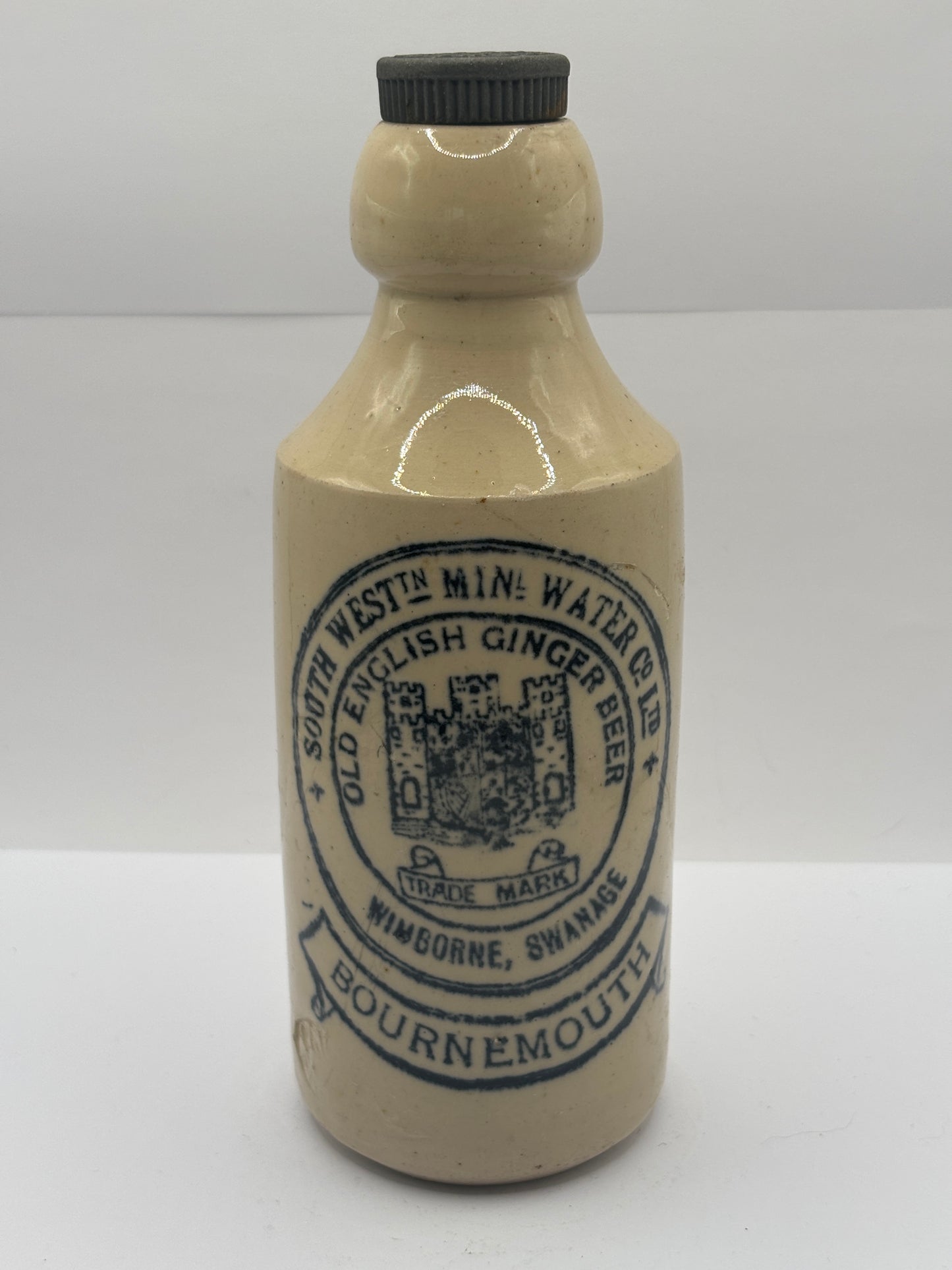 Old stoneware ginger beer bottle, south west mineral water Co, Bournemouth. Wimborne, Swanage