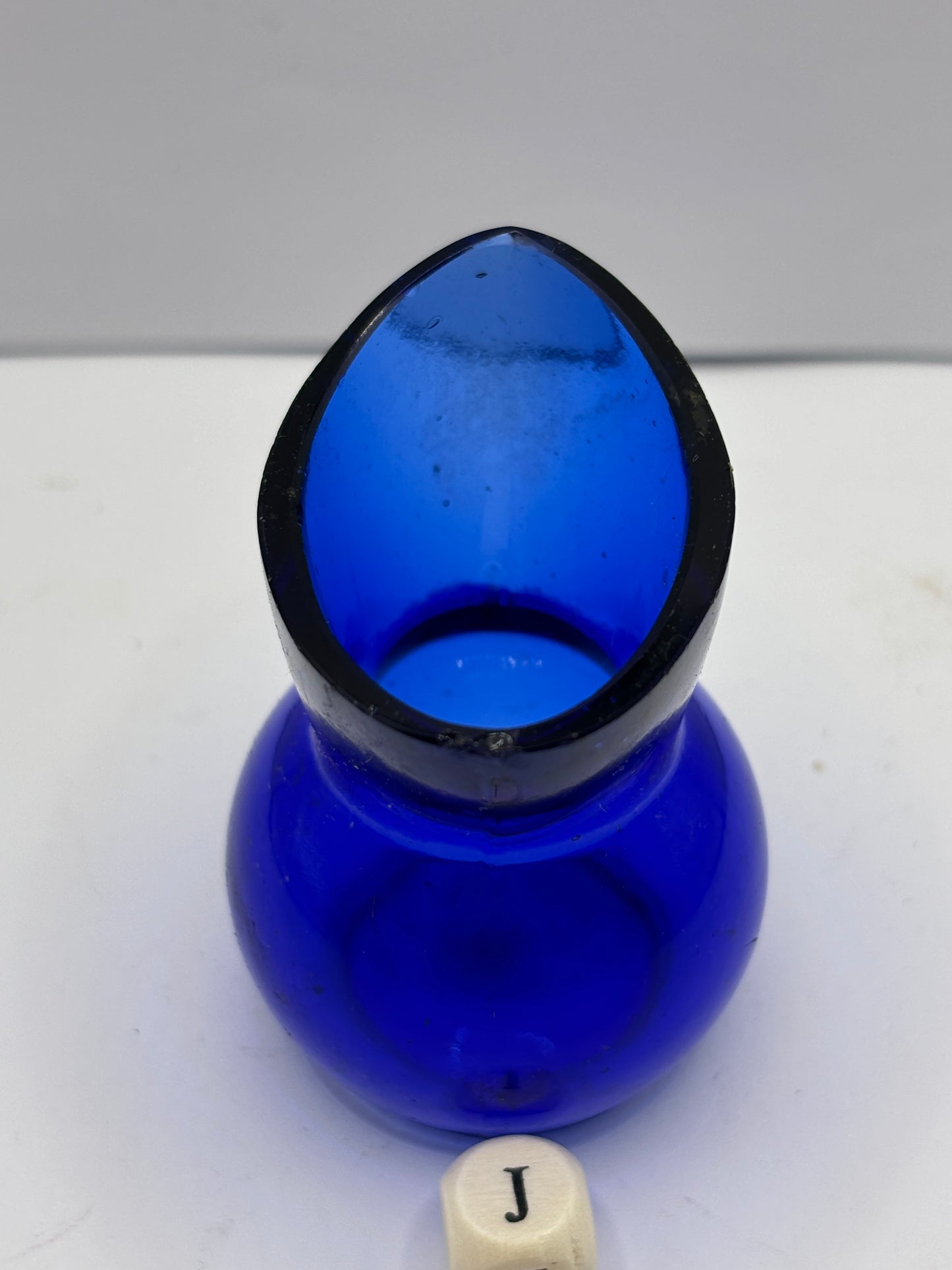 Blue glass eye bath (J)