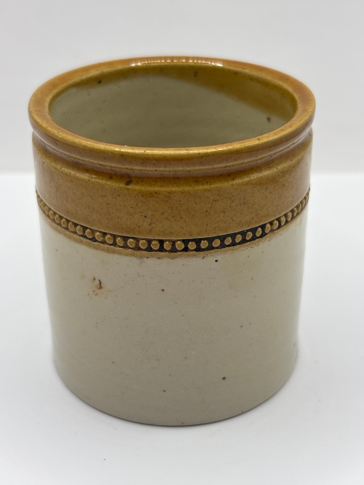 Old small brown top stoneware jar