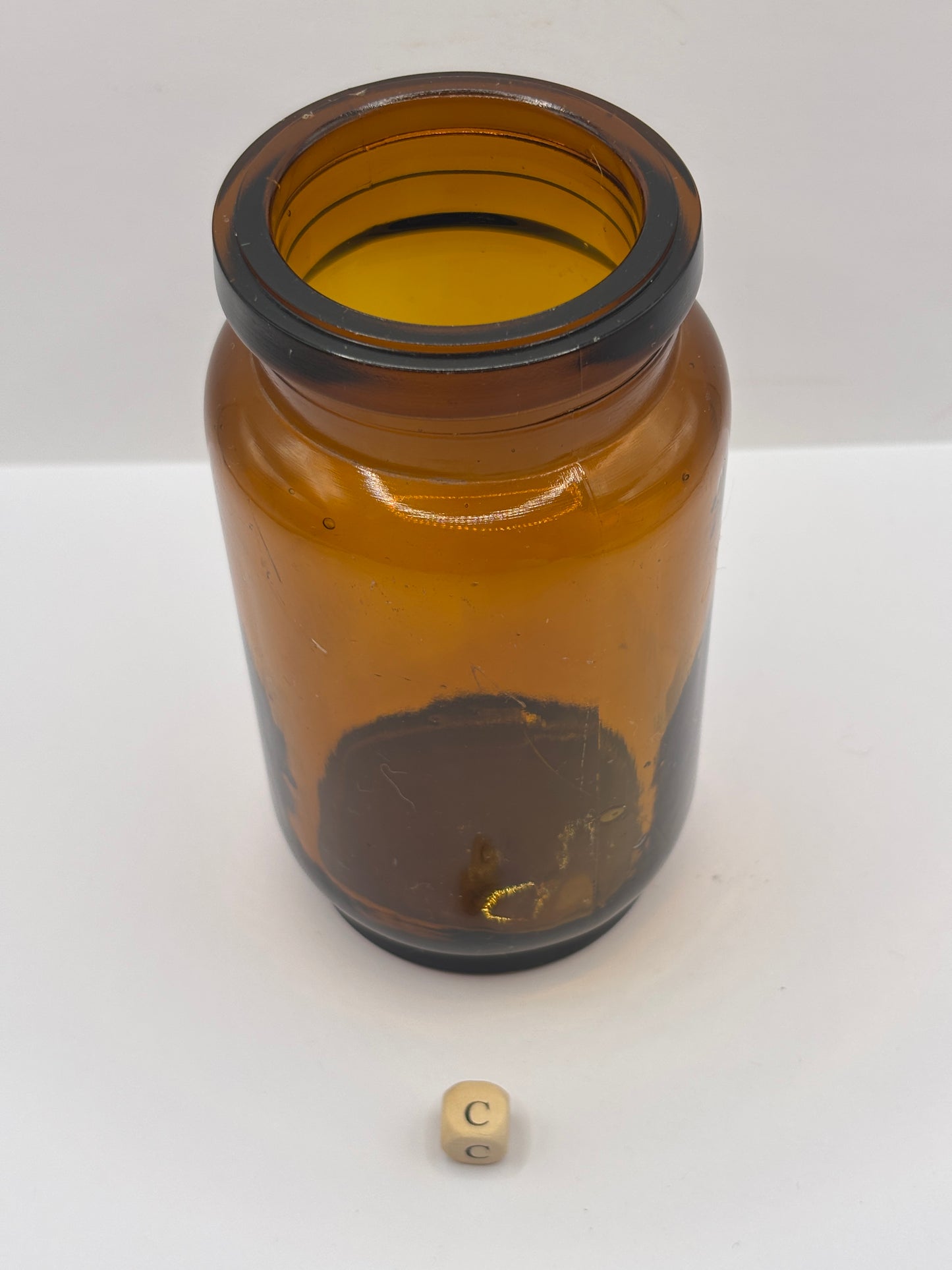Old amber glass jar (c)