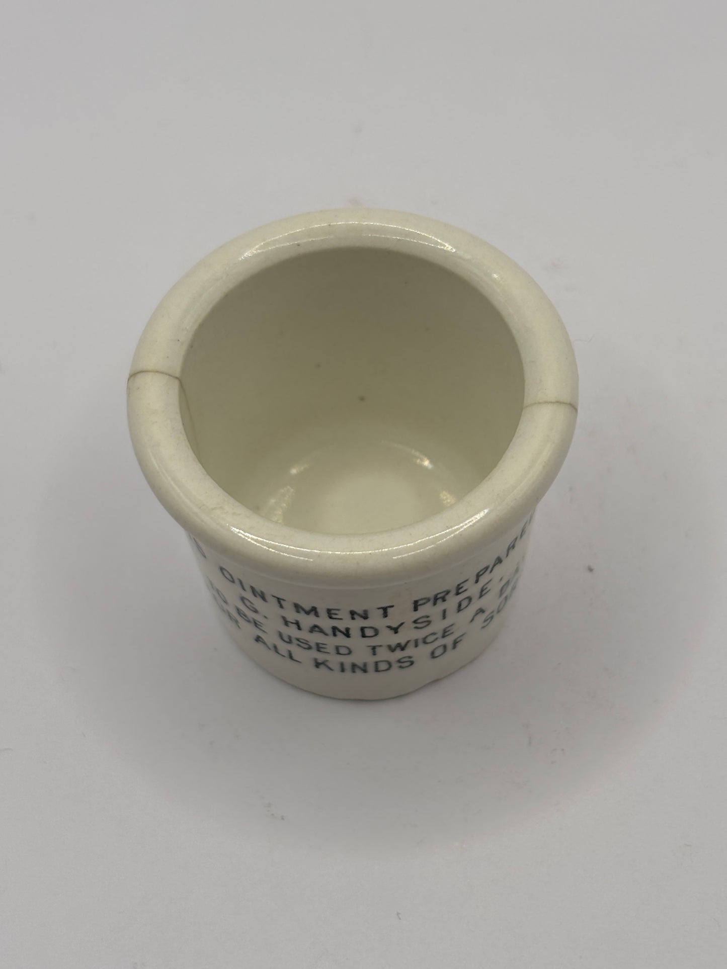Old early advertising ointment pot, Handyside ointment