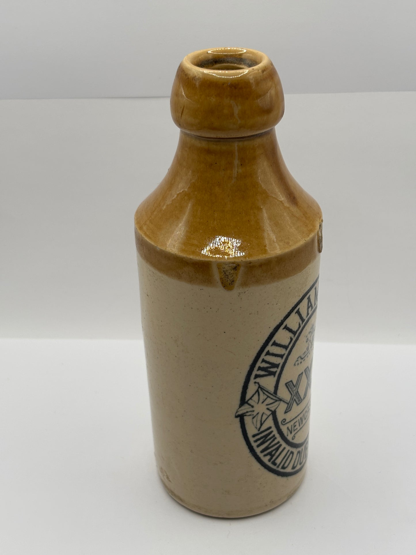 Old stoneware stout bottle, William Rows invalid dublin stout. Newcastle