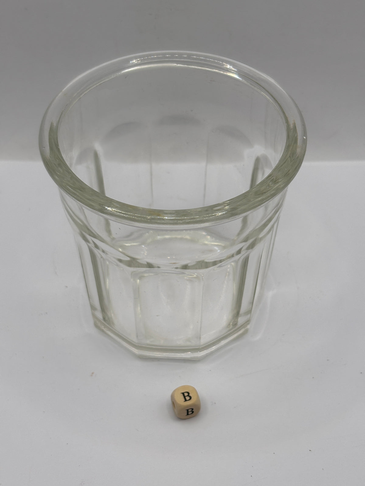 Old clear glass French jam jar (B)